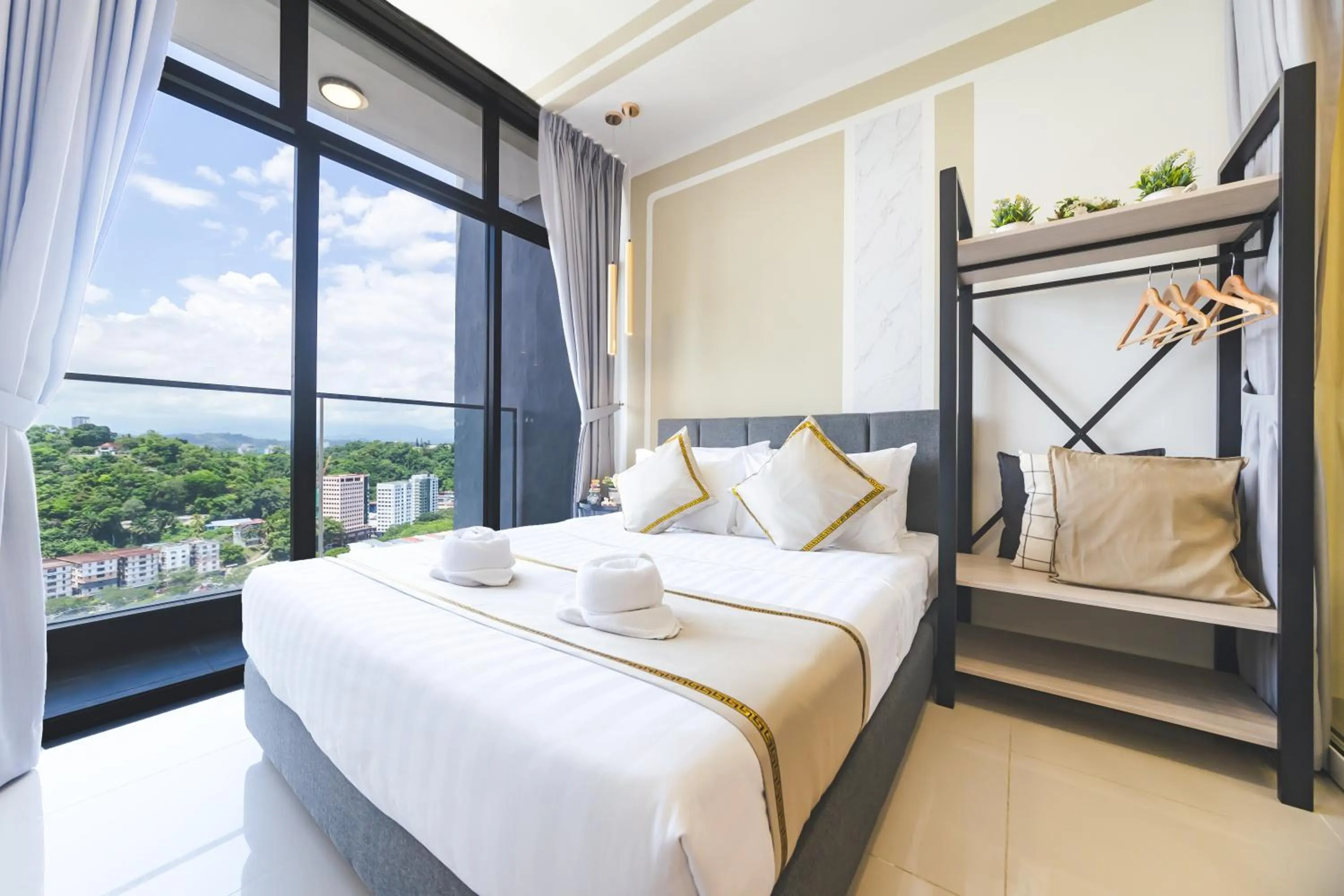 Bed in Beautiful Seaview Suites at The Shore Kota Kinabalu