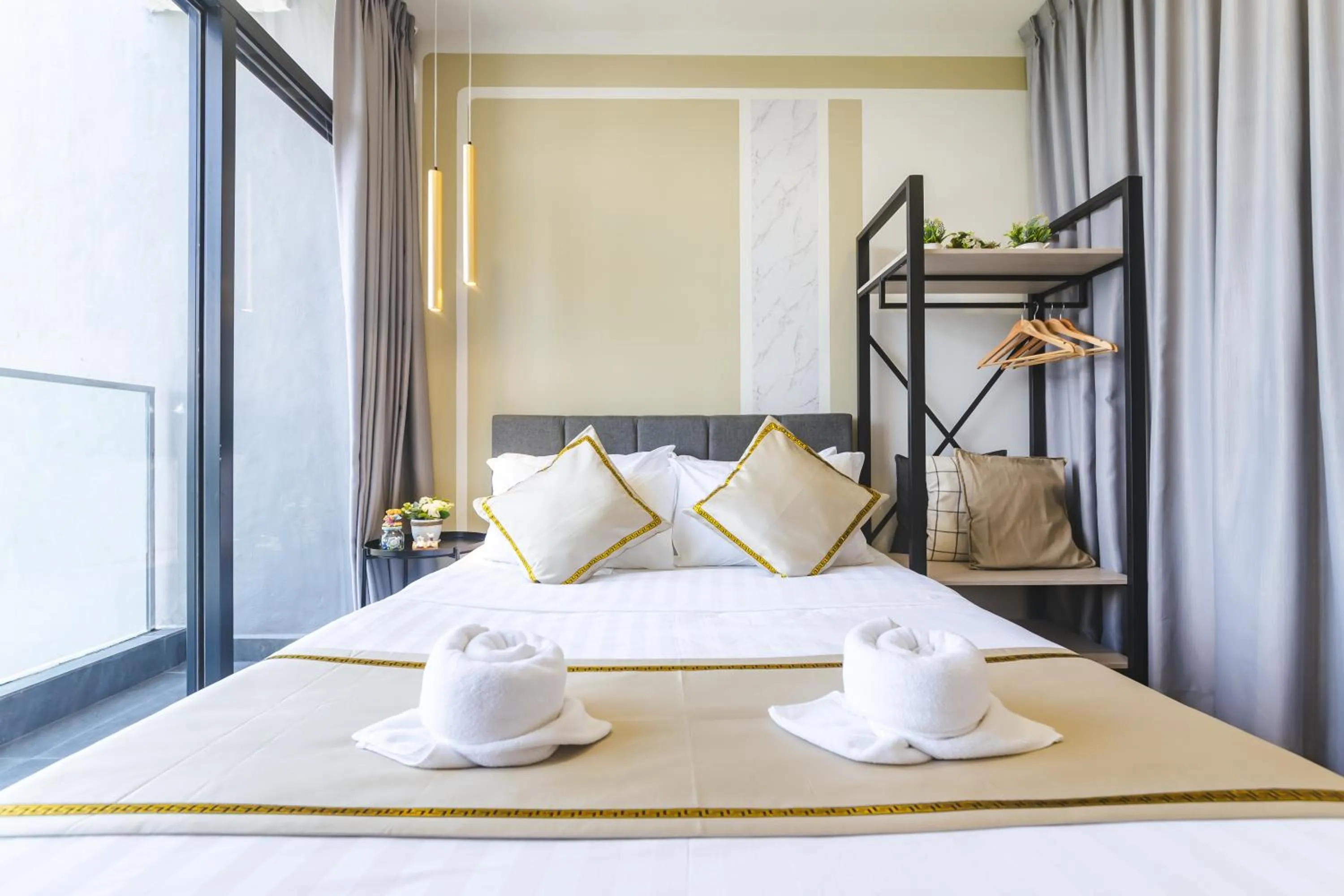 Bed in Beautiful Seaview Suites at The Shore Kota Kinabalu