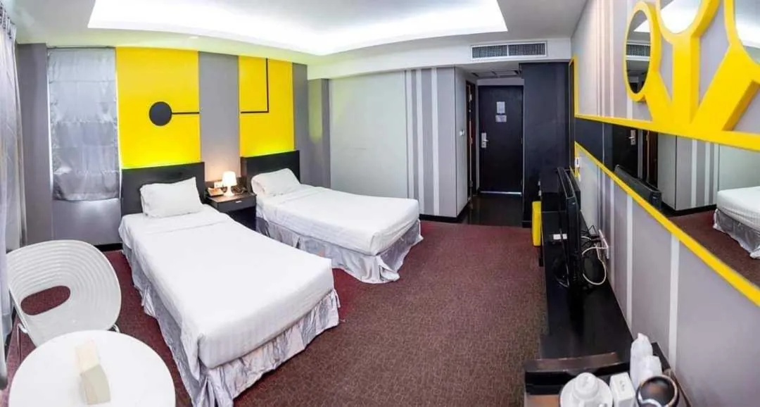 Bedroom in Capital O 75514 Vasidtee City Hotel (Suphanburi)