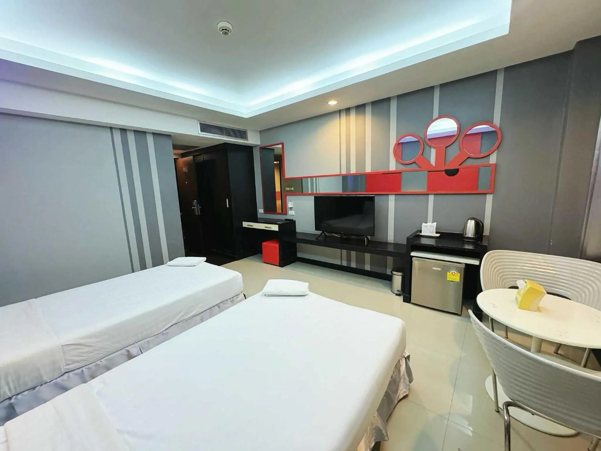 Bedroom in Capital O 75514 Vasidtee City Hotel (Suphanburi)