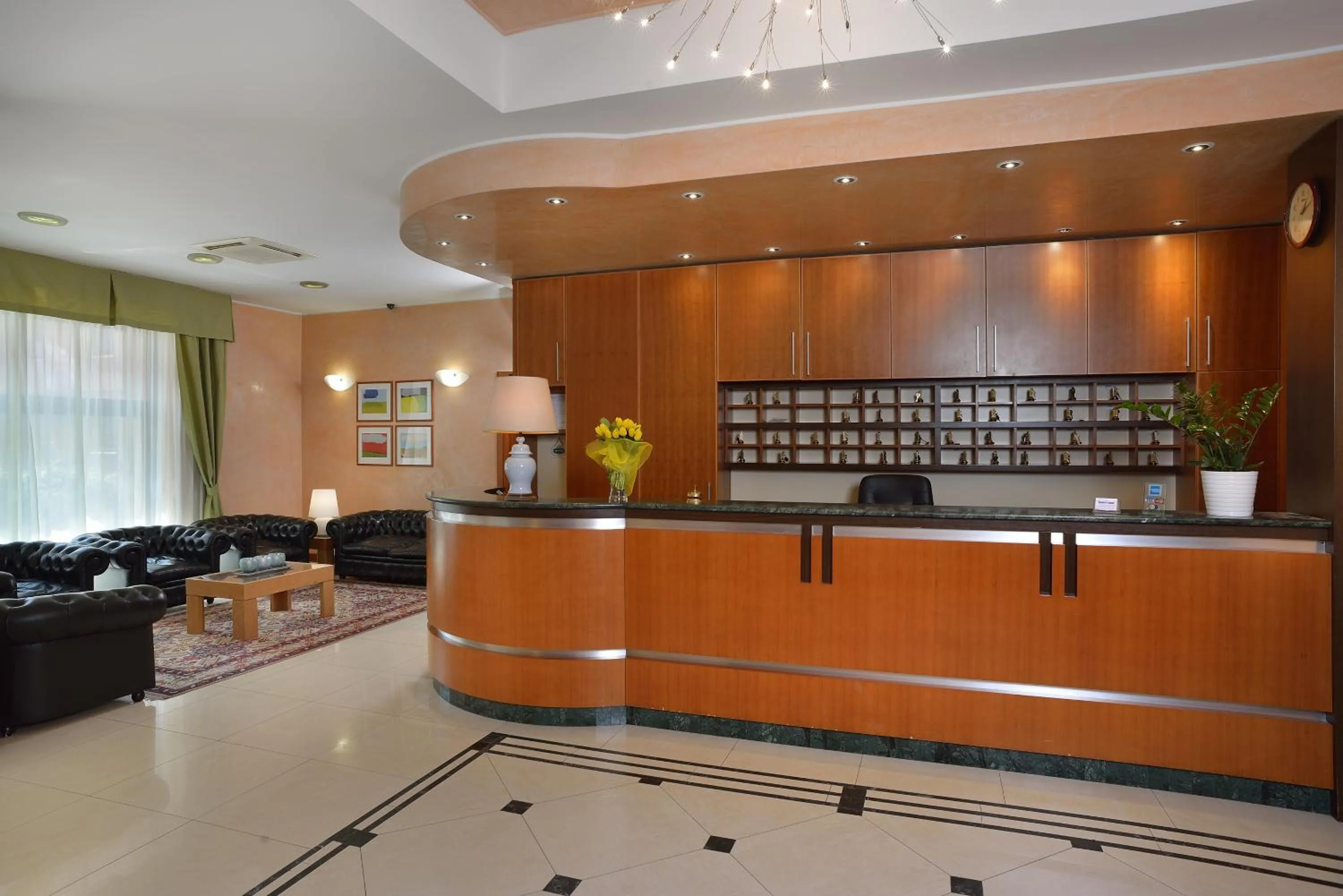 Lobby or reception in Astor Hotel