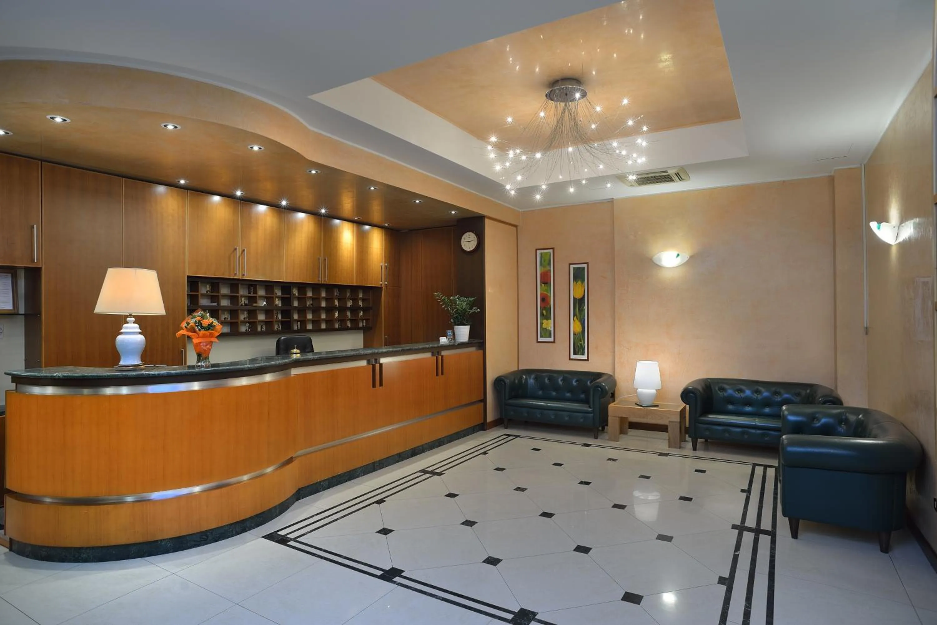 Lobby or reception in Astor Hotel