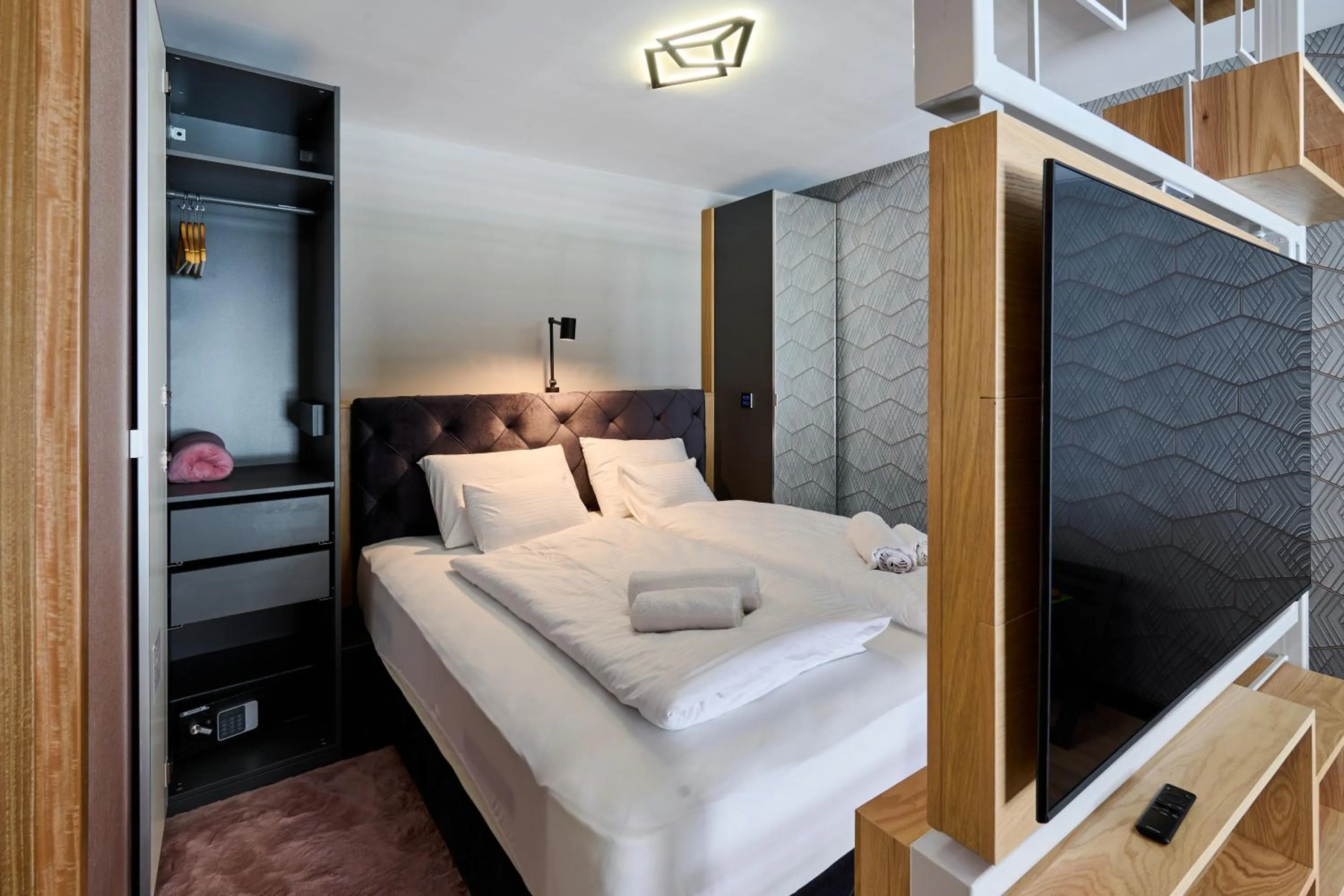 Bed in GRANDIS Premium Apartments