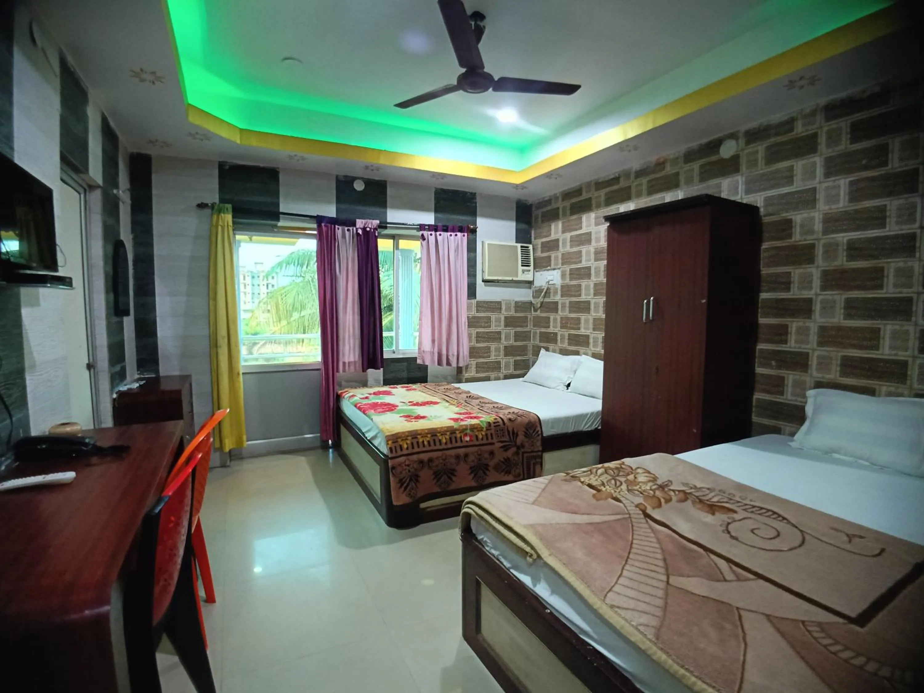 Bed in RESORT K SEA VIEW Digha
