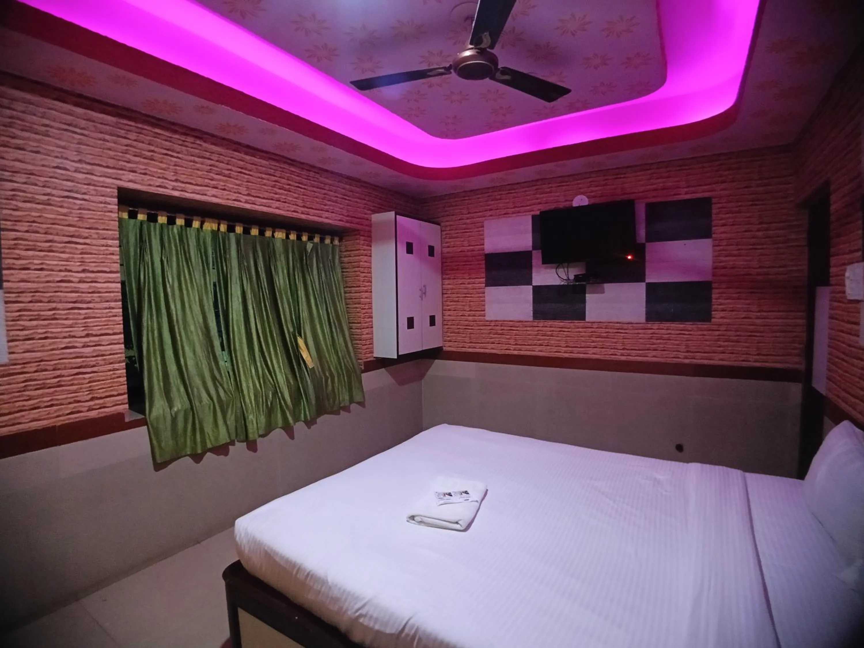 Bed in RESORT K SEA VIEW Digha