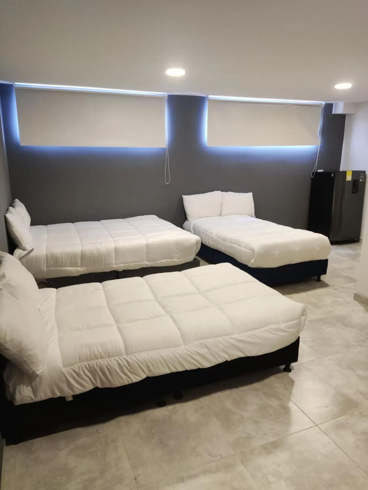 Bed in Xliving Host and Rooms