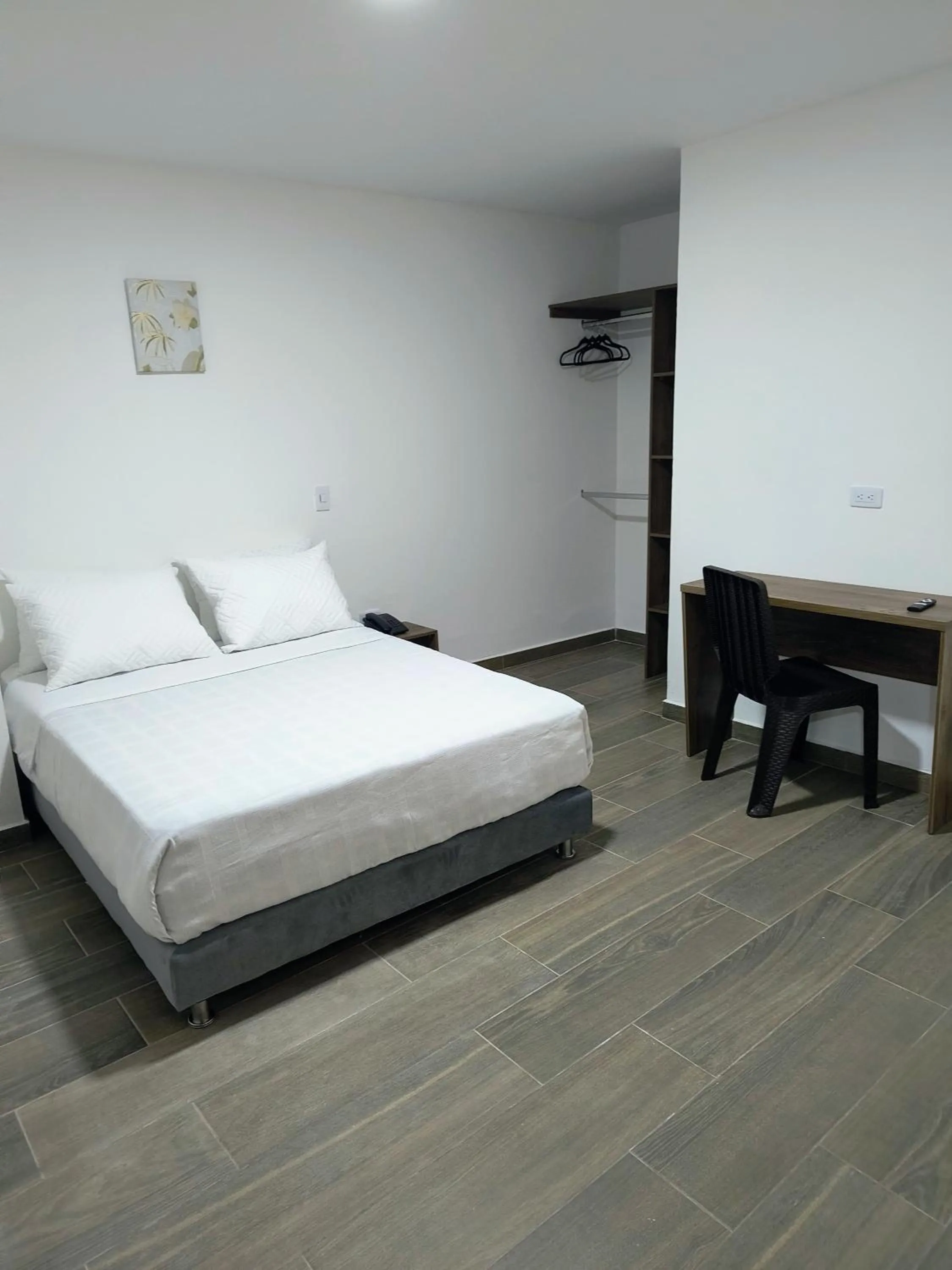 Bed in Xliving Host and Rooms