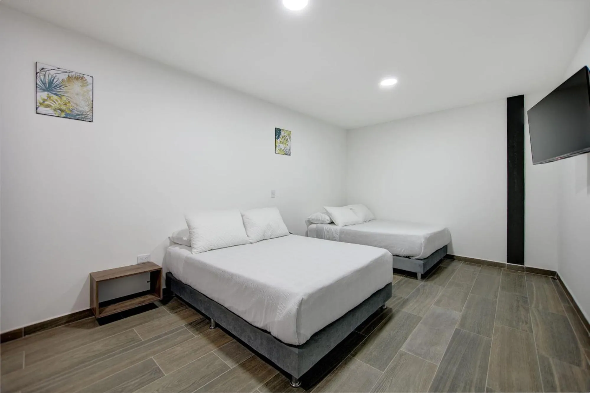 Bed in Xliving Host and Rooms