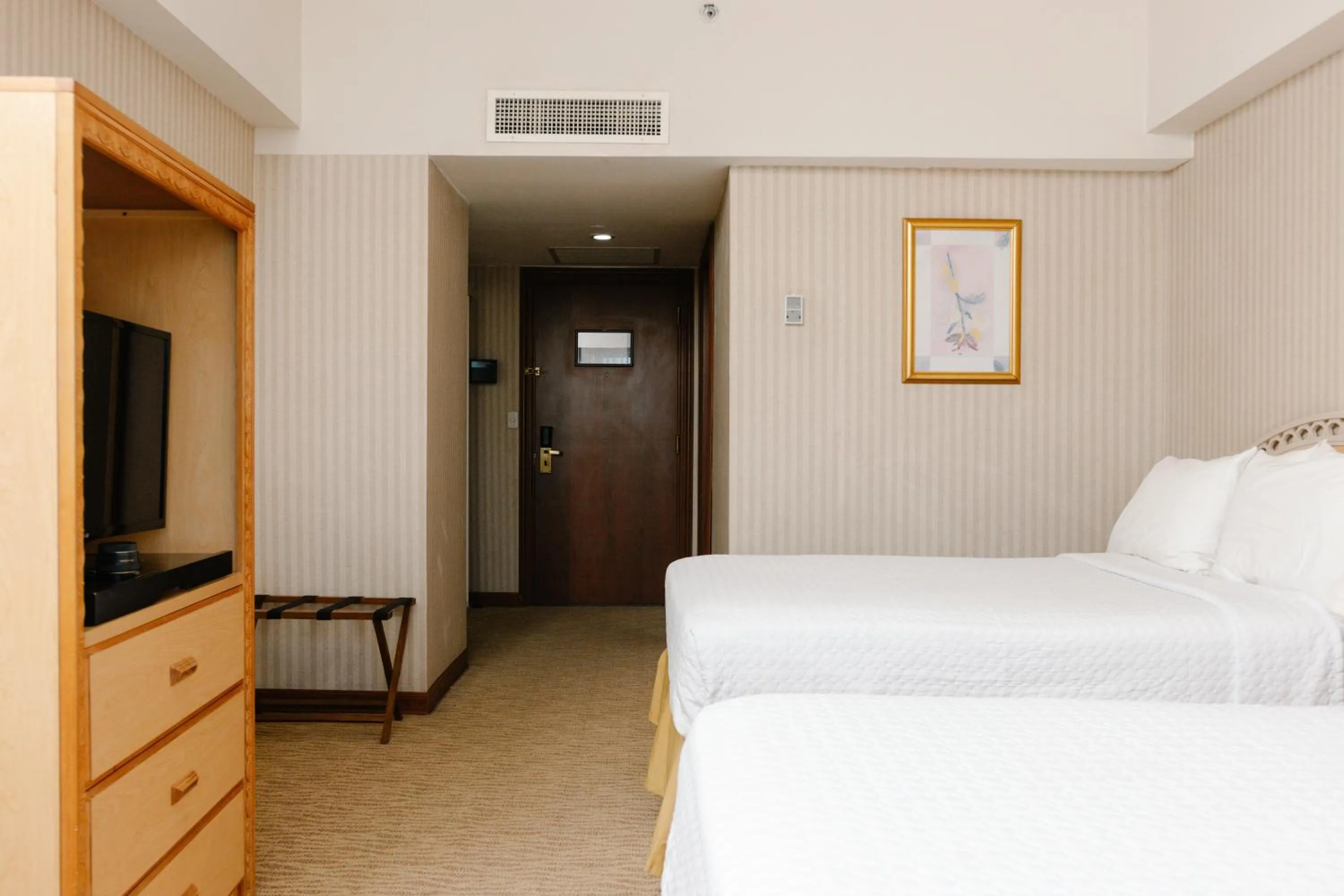 Bed in Intercity Tower Hotels