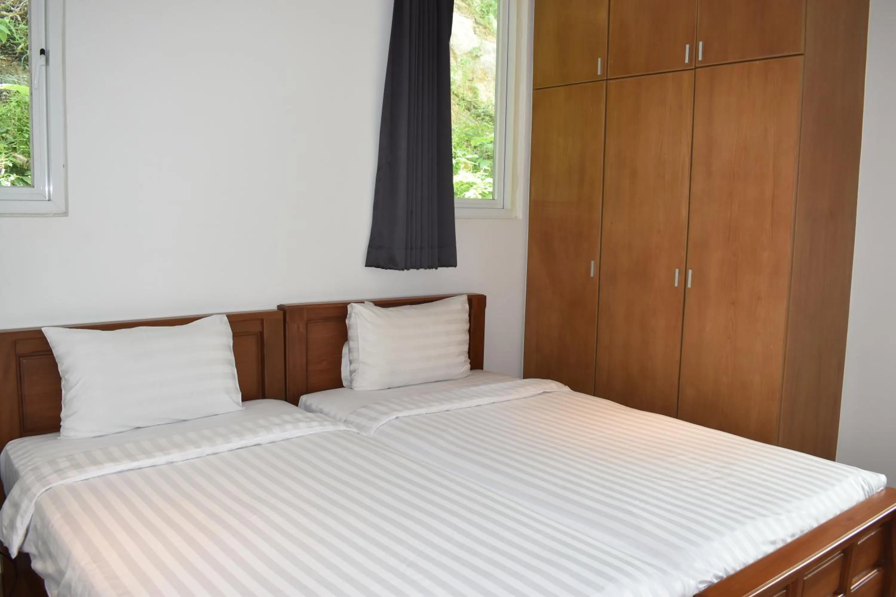 Bed in Grand Kamala Falls