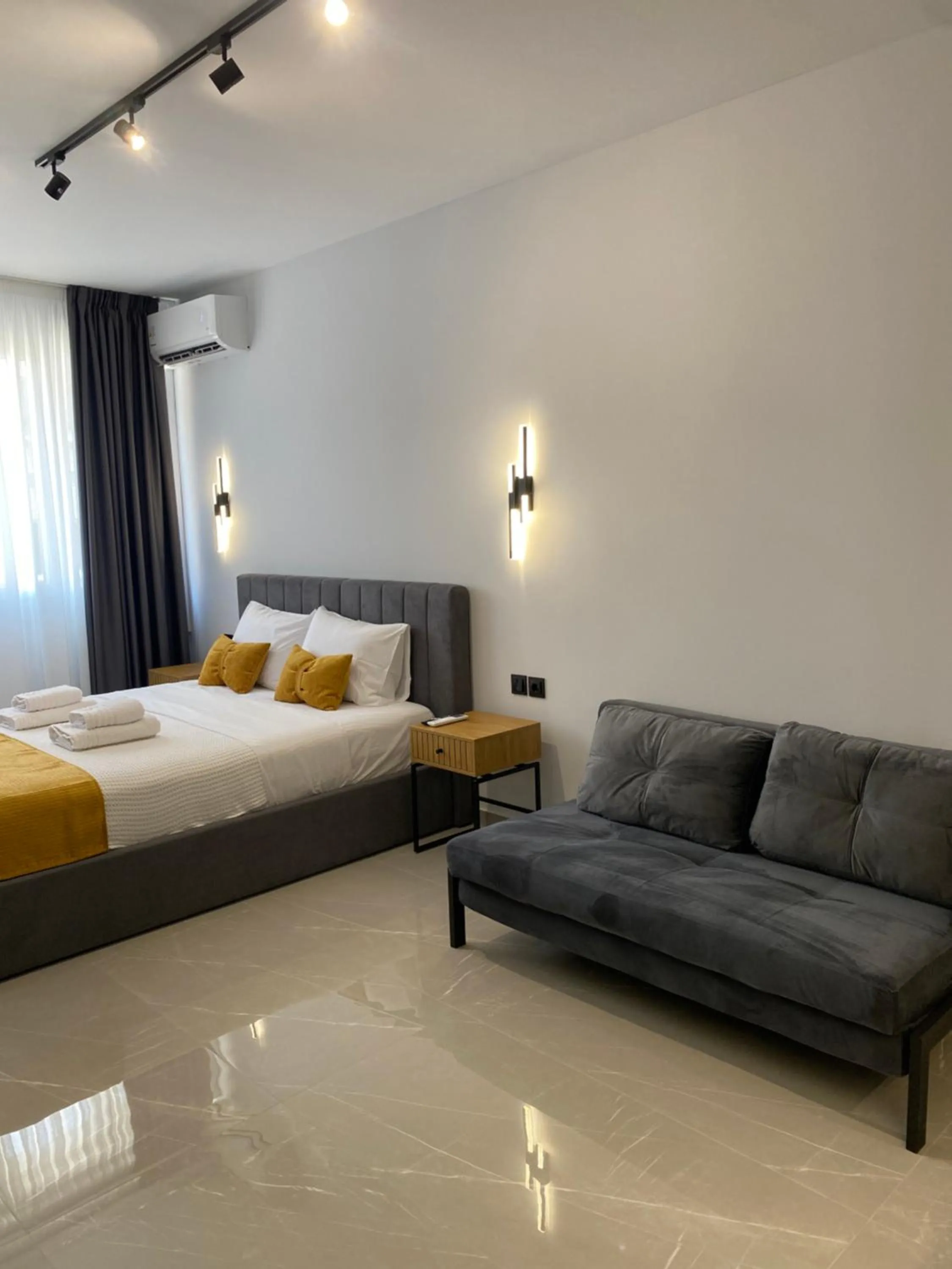 Superior Quadruple Room in Thess Living Suites