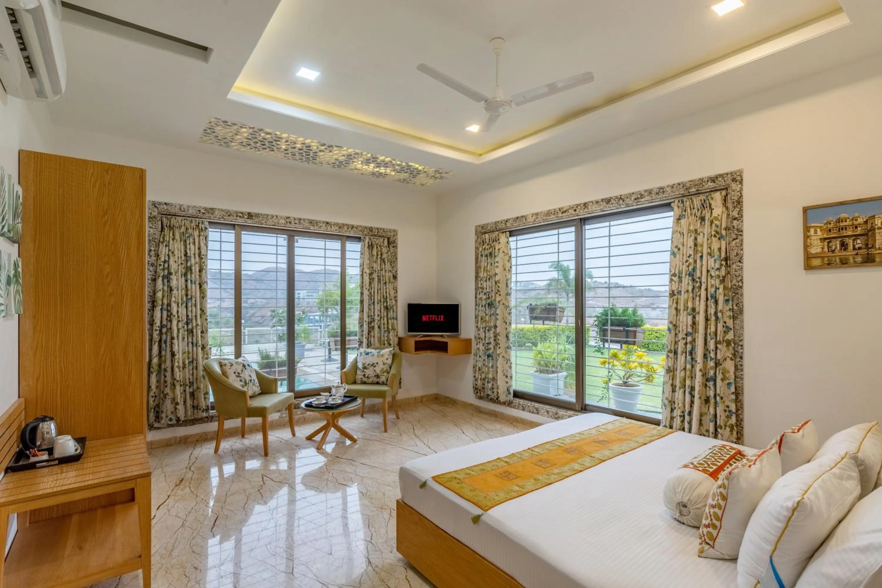Bed in ELIVAAS Shourya Celesta Luxe 3BHK Villa with Pvt Pool, Udaipur