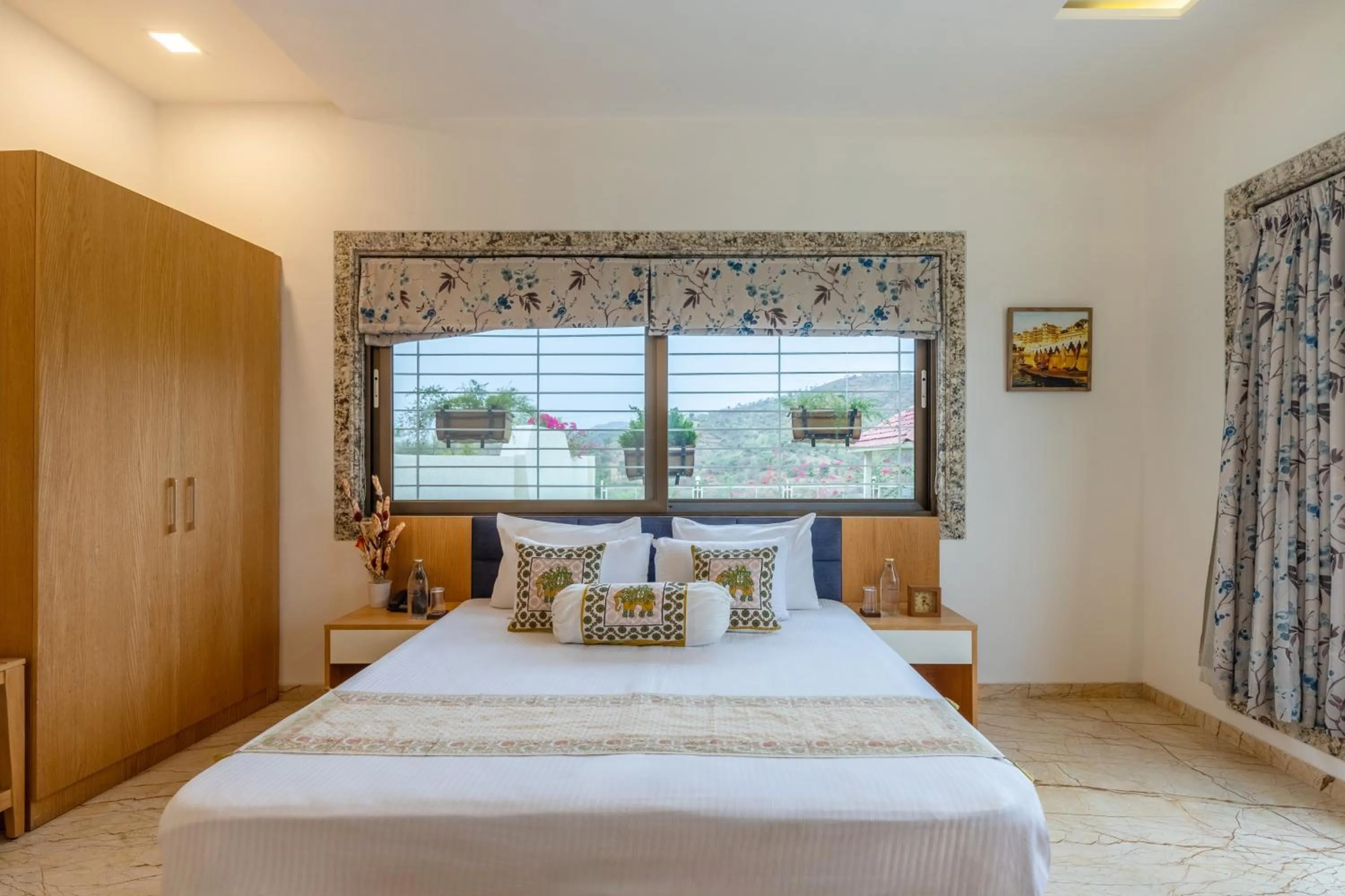 Bed in ELIVAAS Shourya Celesta Luxe 3BHK Villa with Pvt Pool, Udaipur