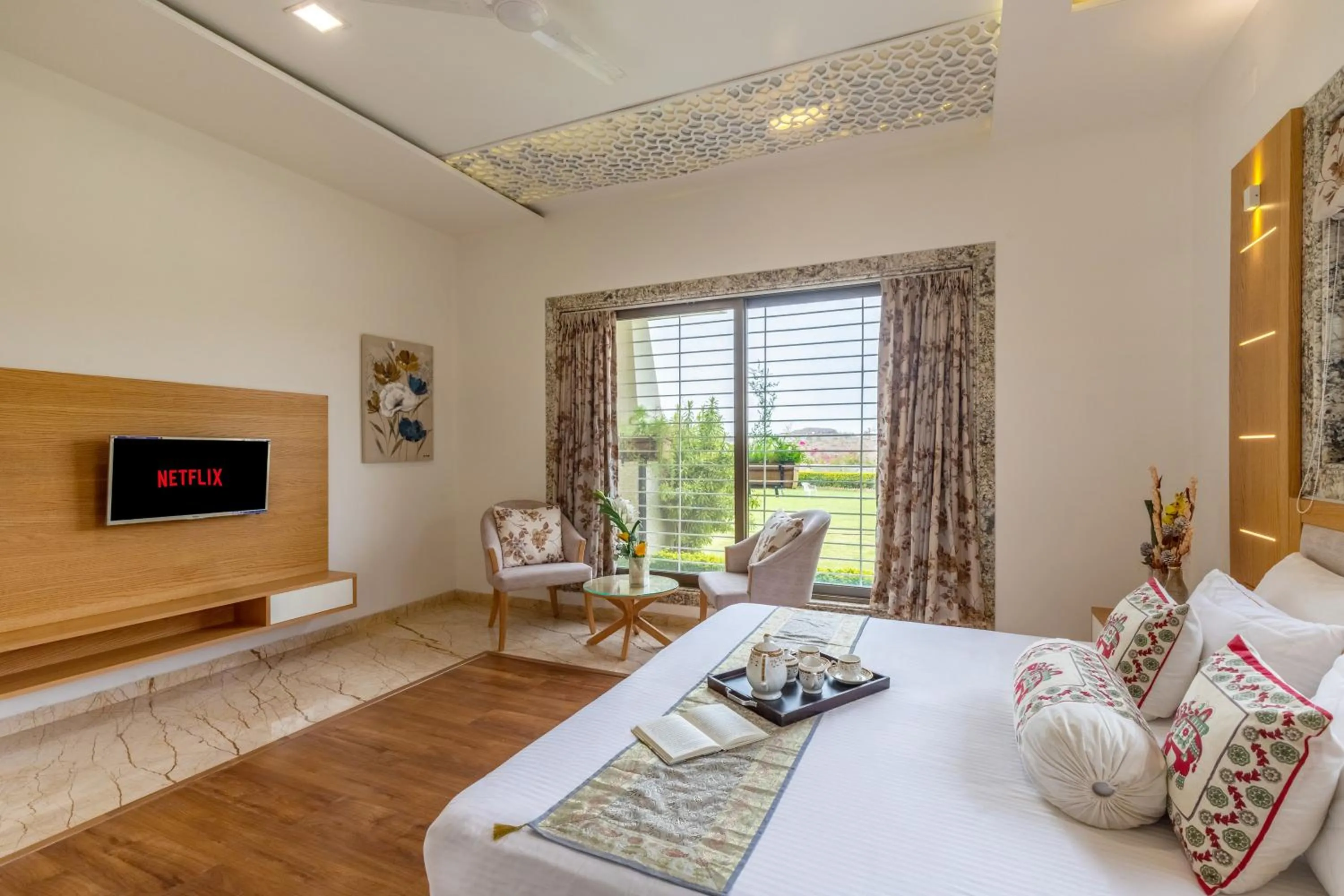 Bed in ELIVAAS Shourya Celesta Luxe 3BHK Villa with Pvt Pool, Udaipur