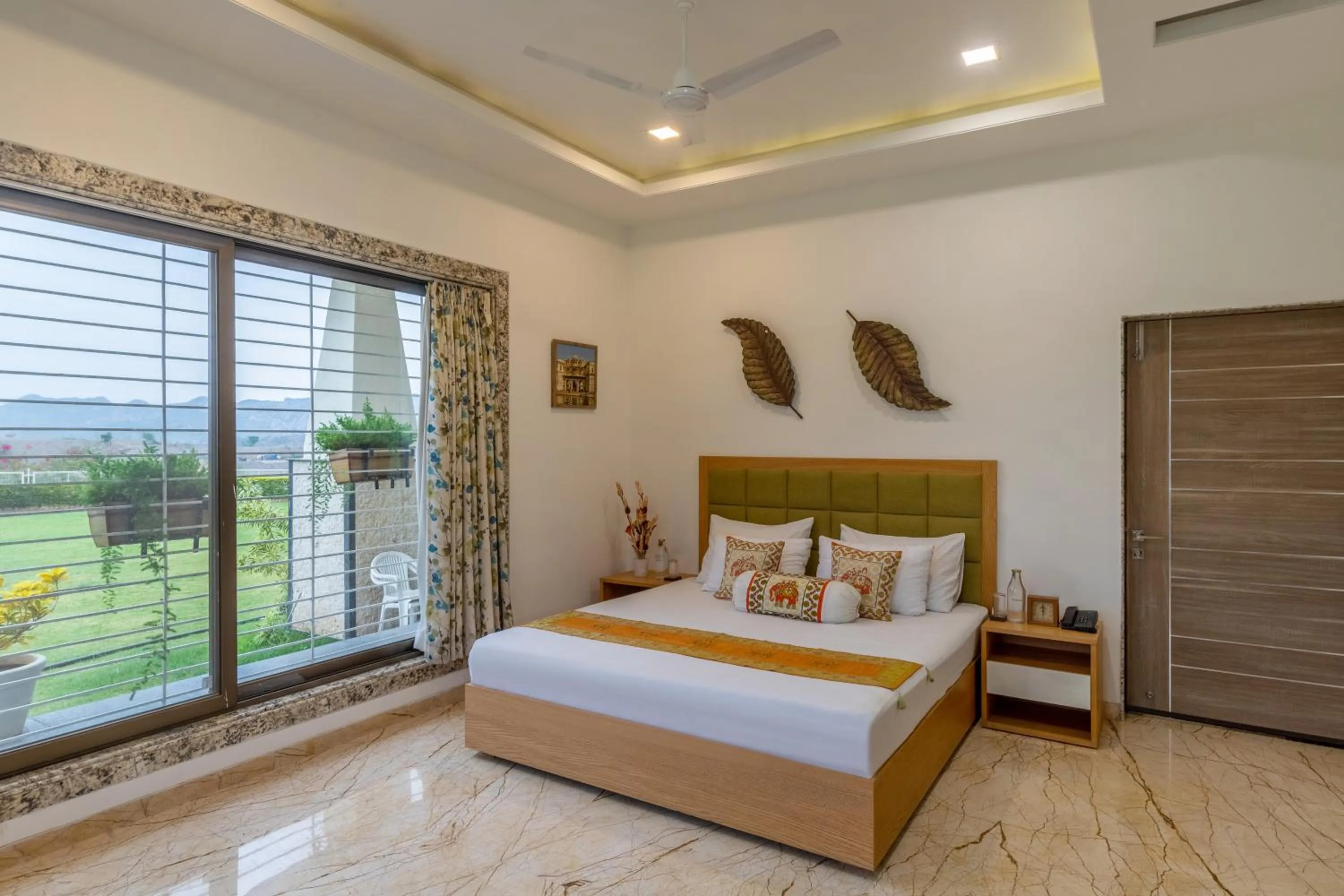 Bed in ELIVAAS Shourya Celesta Luxe 3BHK Villa with Pvt Pool, Udaipur