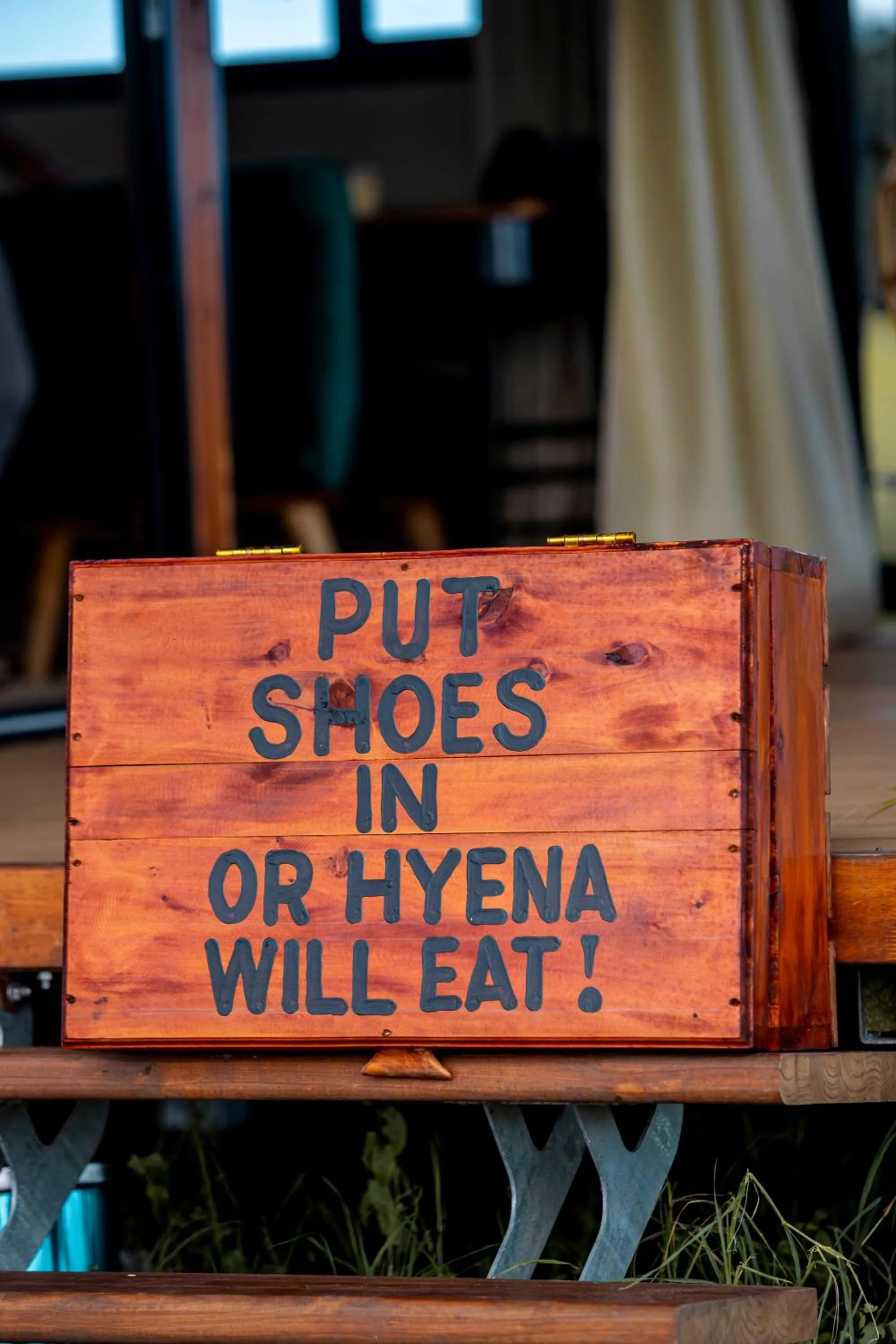 Text overlay in Escarpment Serengeti Luxury Camp