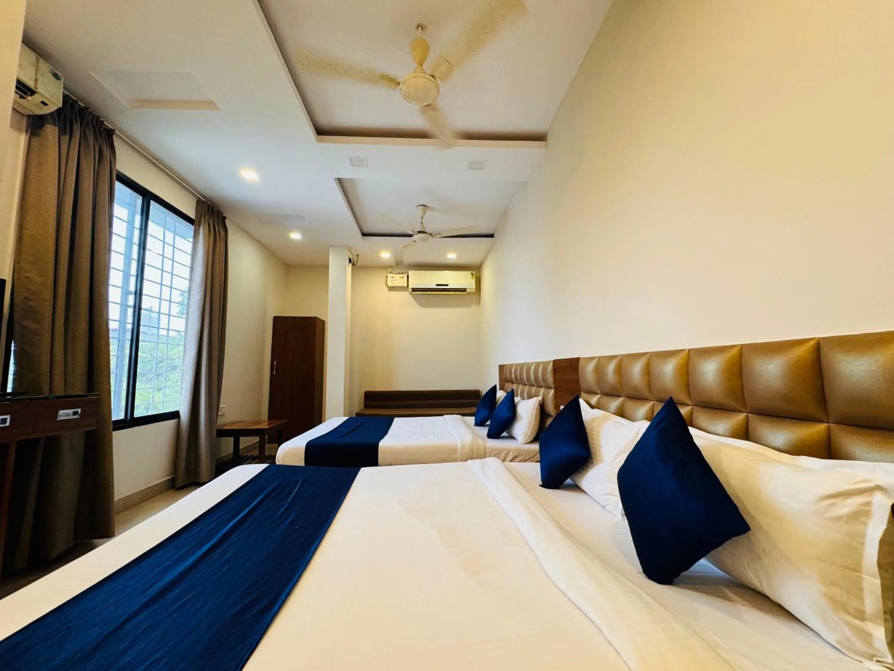 Photo of the whole room, Bed in Hotel Suryodaya