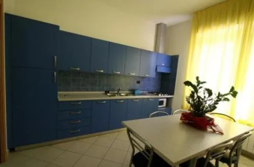 Kitchen or kitchenette in Residence Beach Paradise