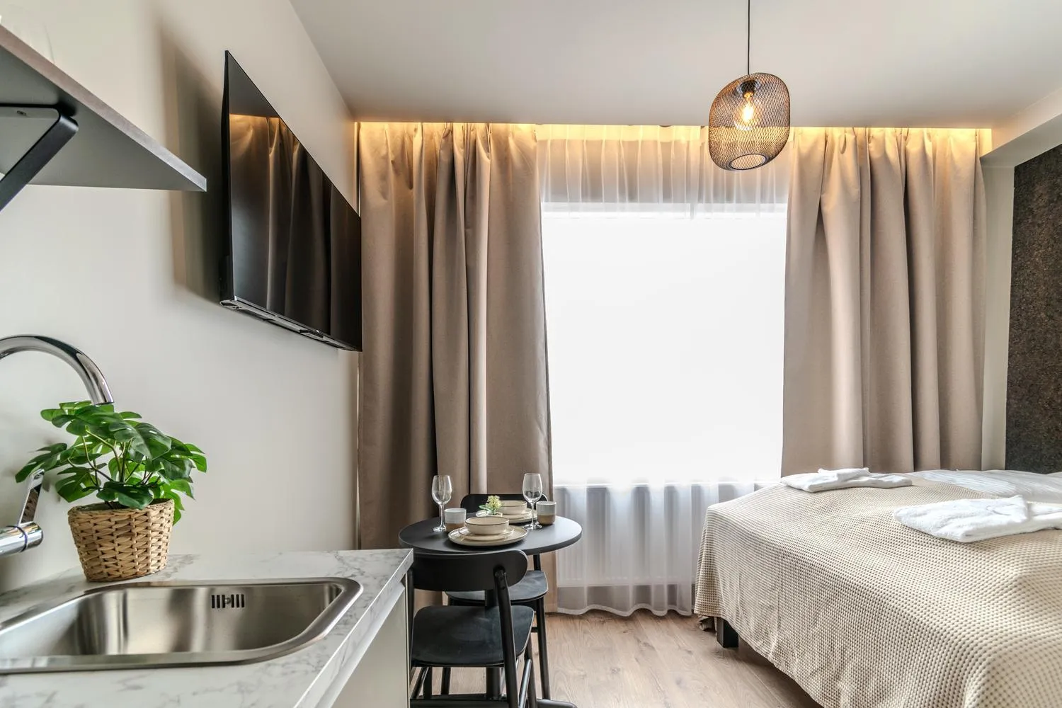 Bed in Frost Apartments by Heimaleiga