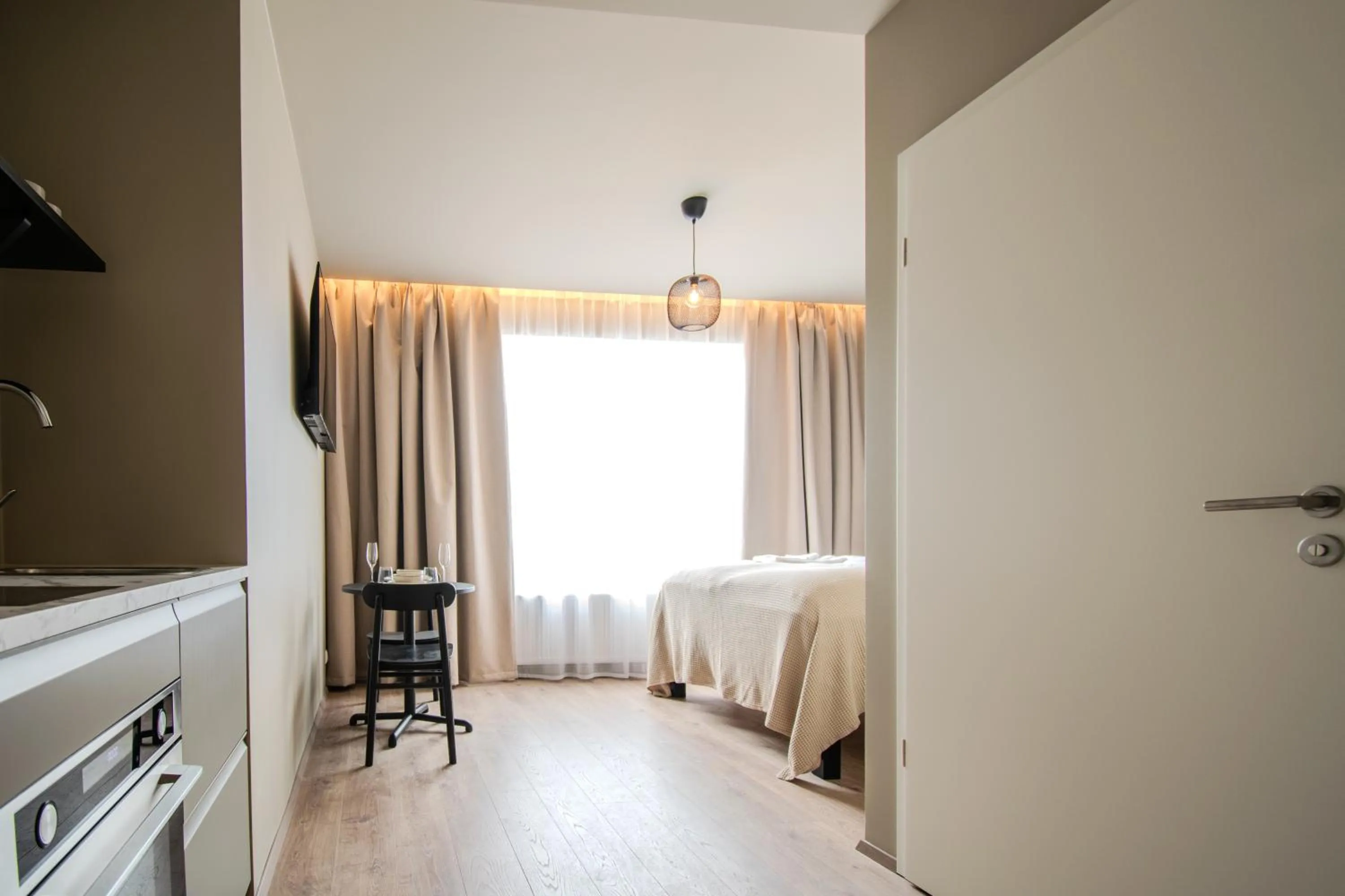 Bed in Frost Apartments by Heimaleiga