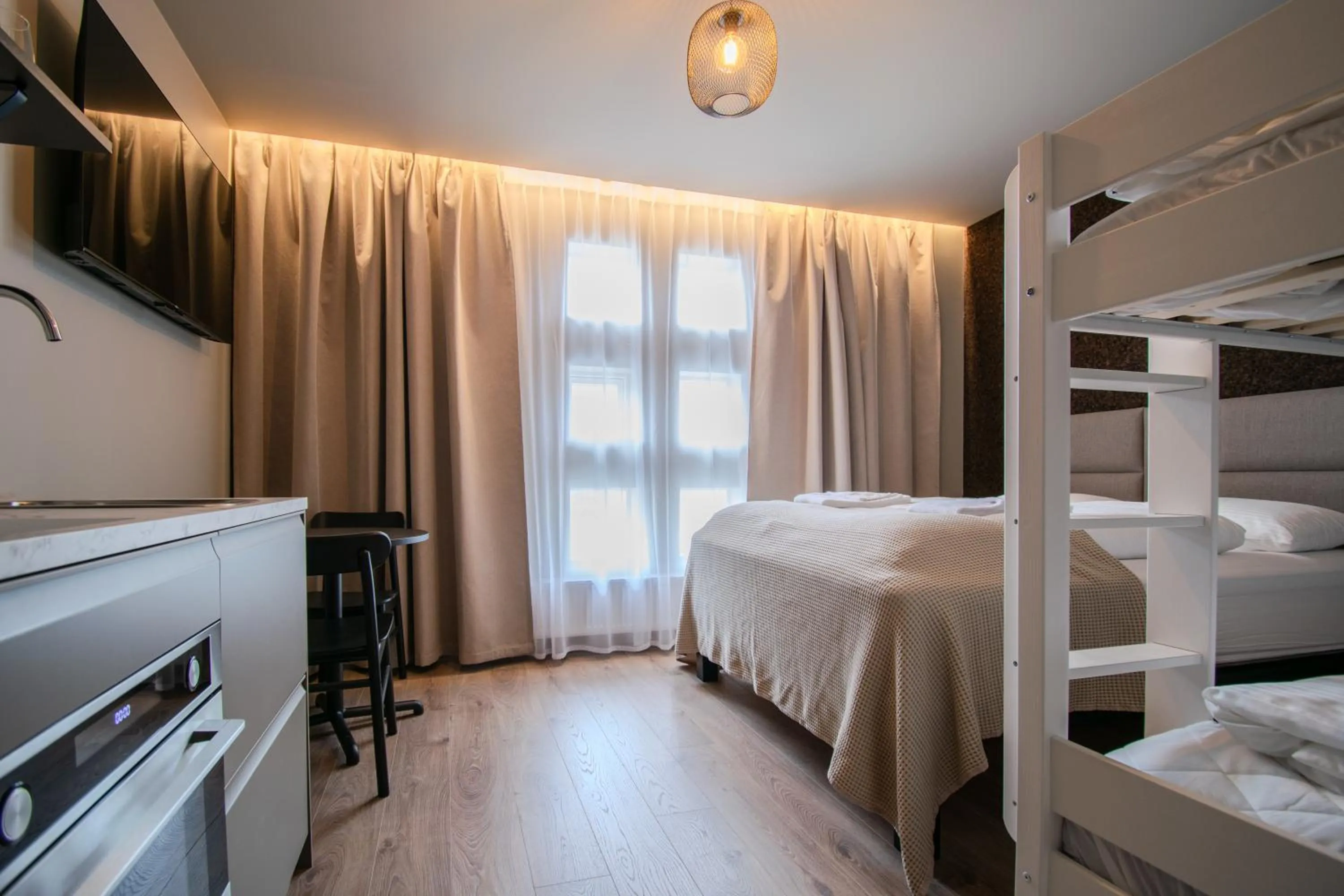 Bed in Frost Apartments by Heimaleiga