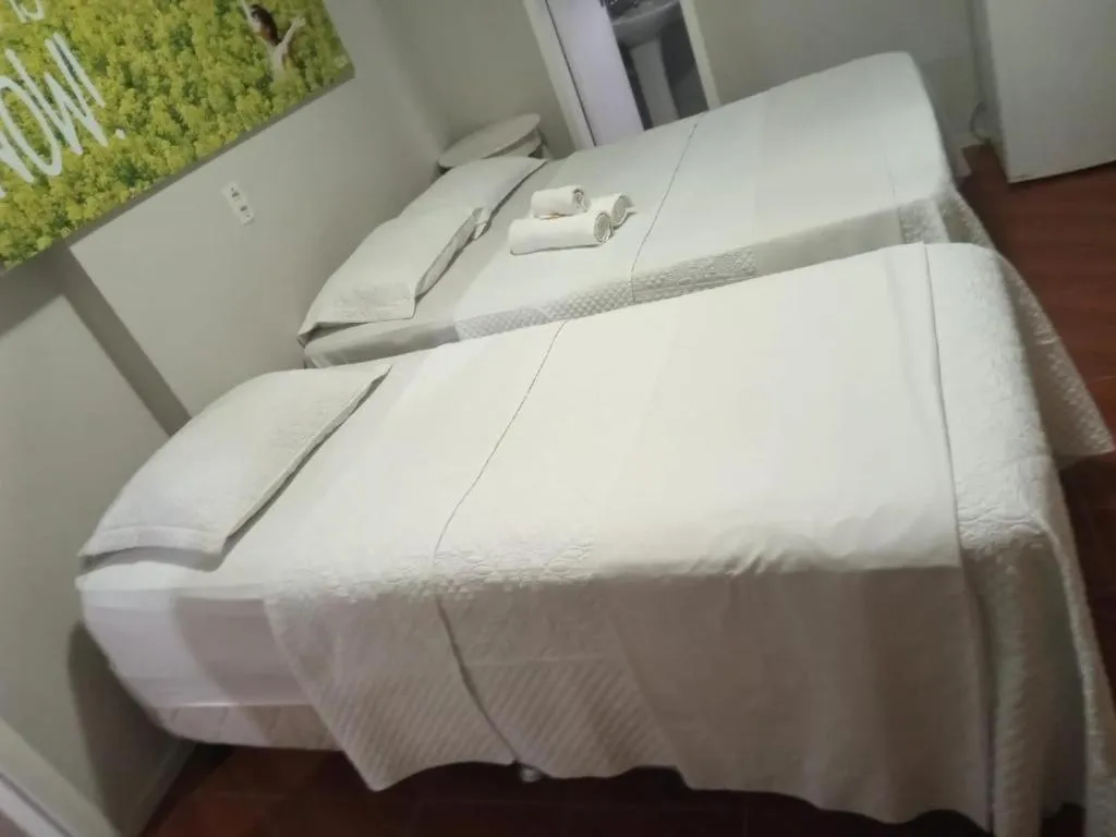 Bed in Pousada Areia da Praia
