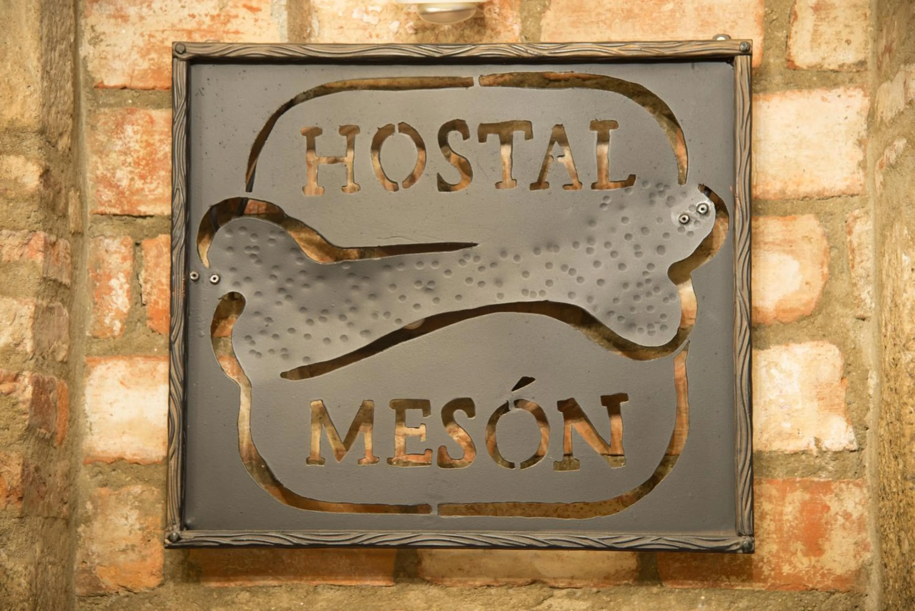 Property logo or sign in Hostal Hueso