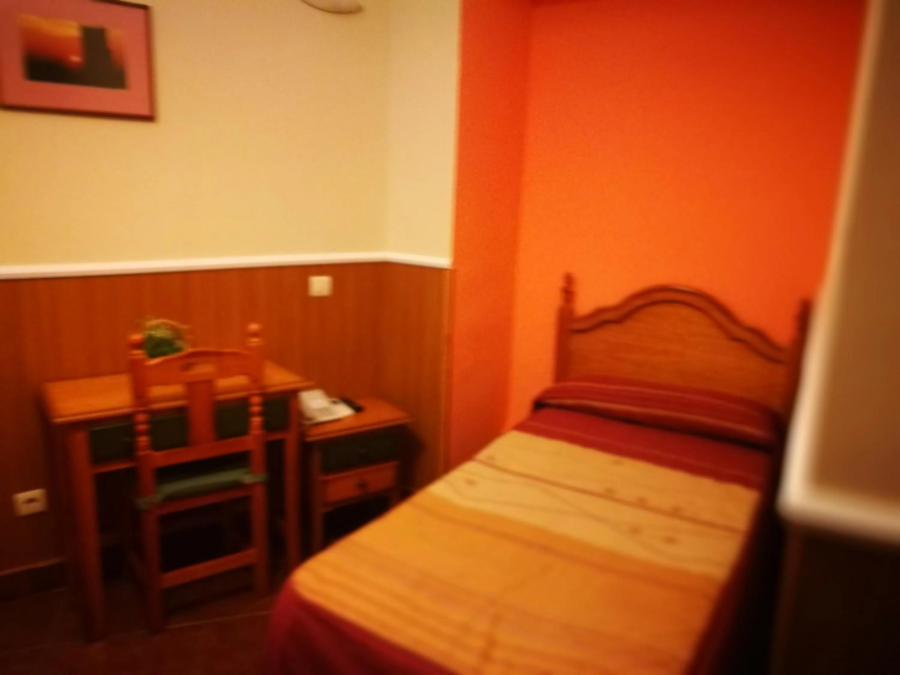Bed in Hostal Hueso