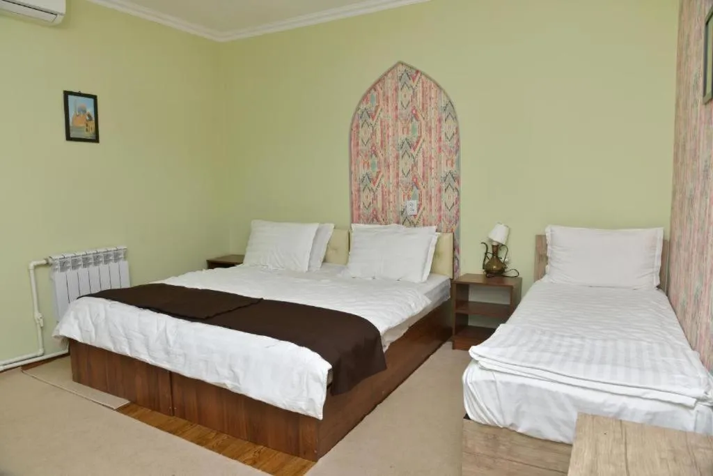 Bed in Mulberry Hotel