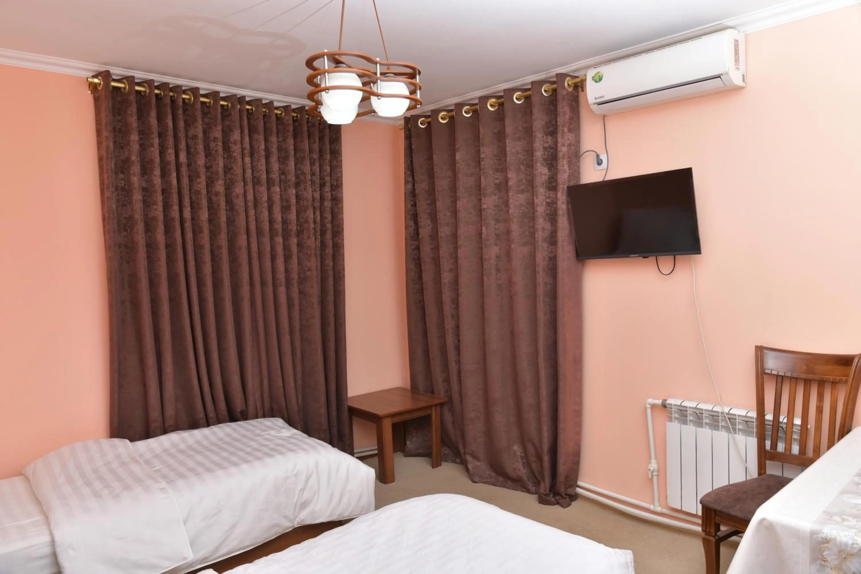 Bed in Mulberry Hotel