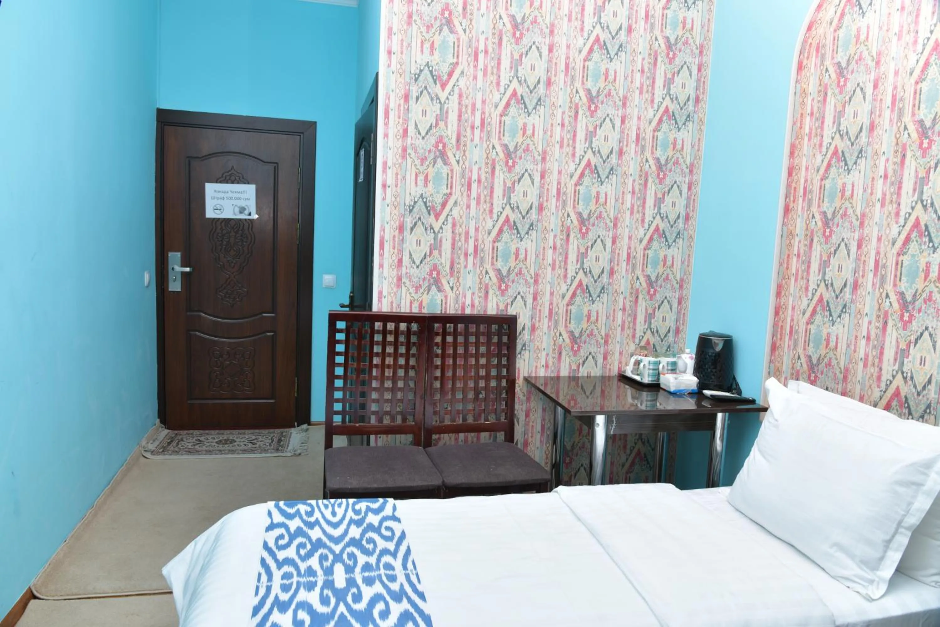 Bed in Mulberry Hotel