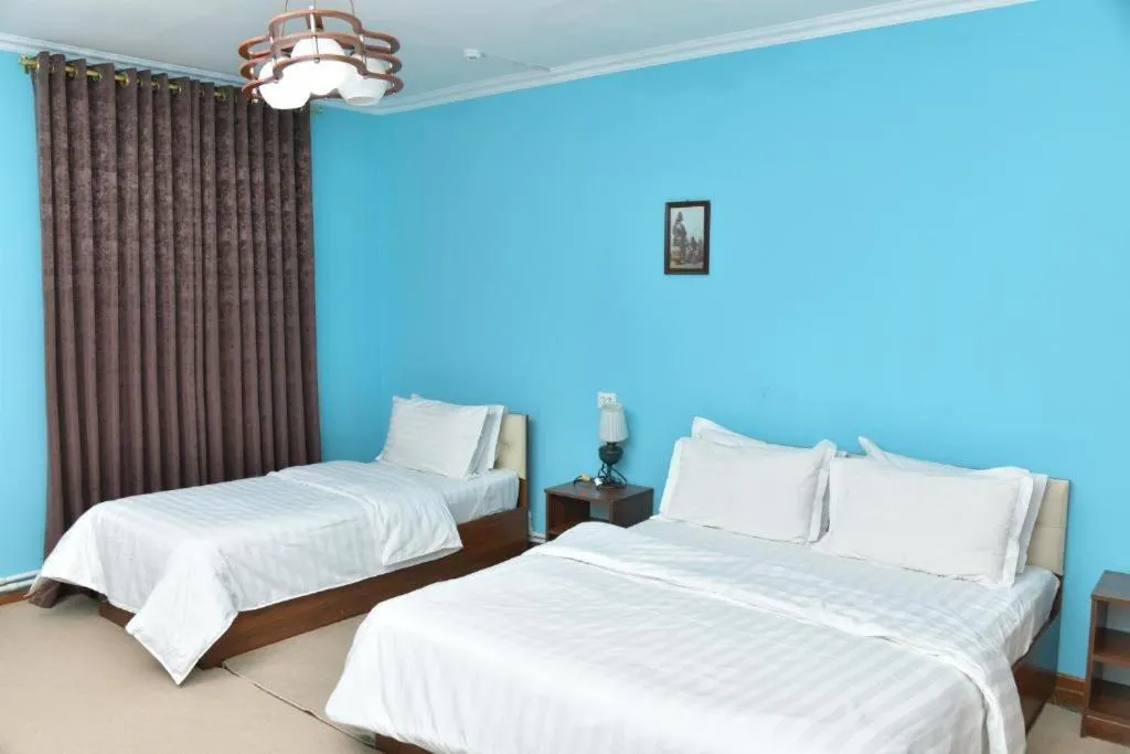 Bed in Mulberry Hotel