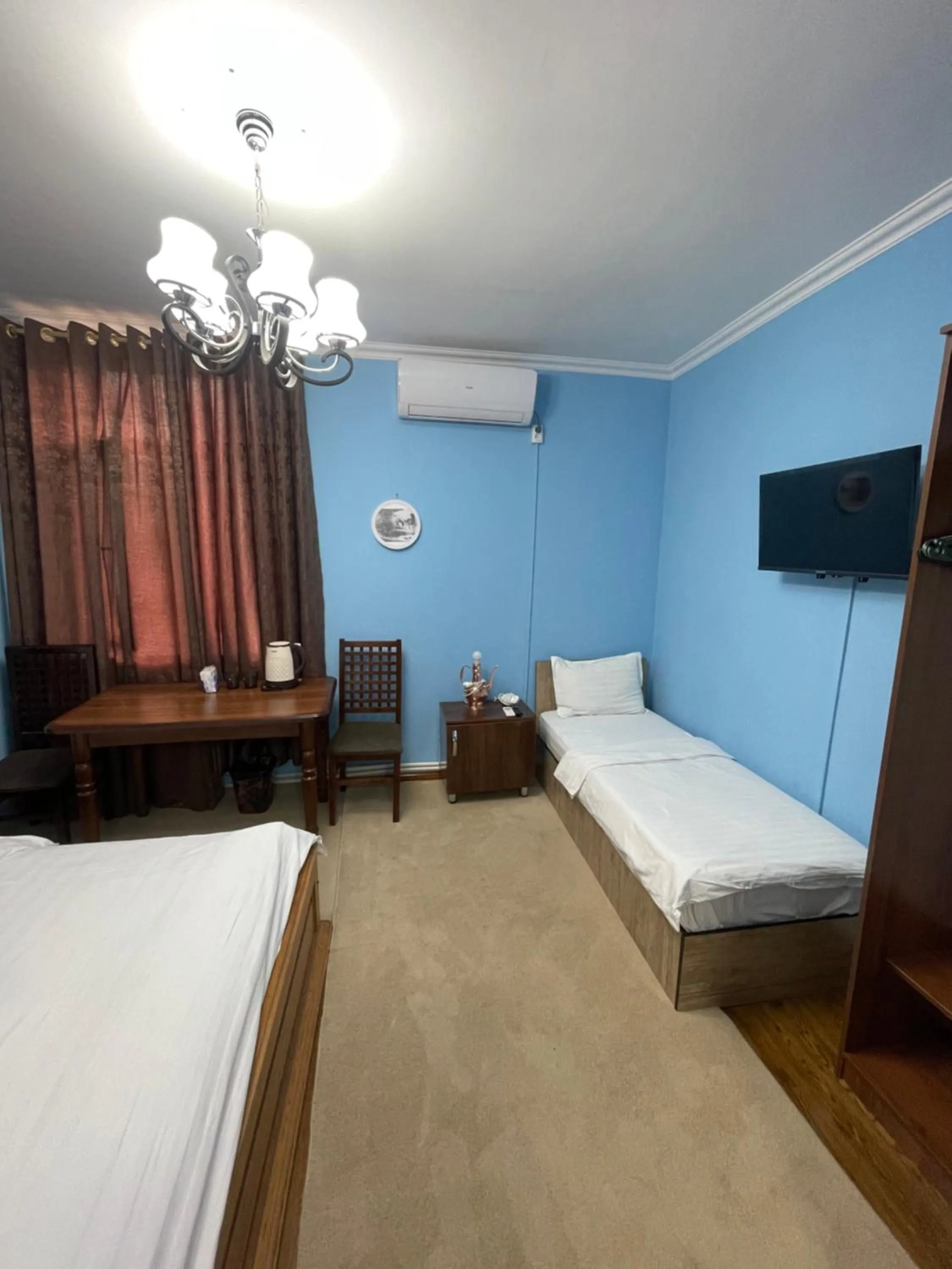 Bed in Mulberry Hotel
