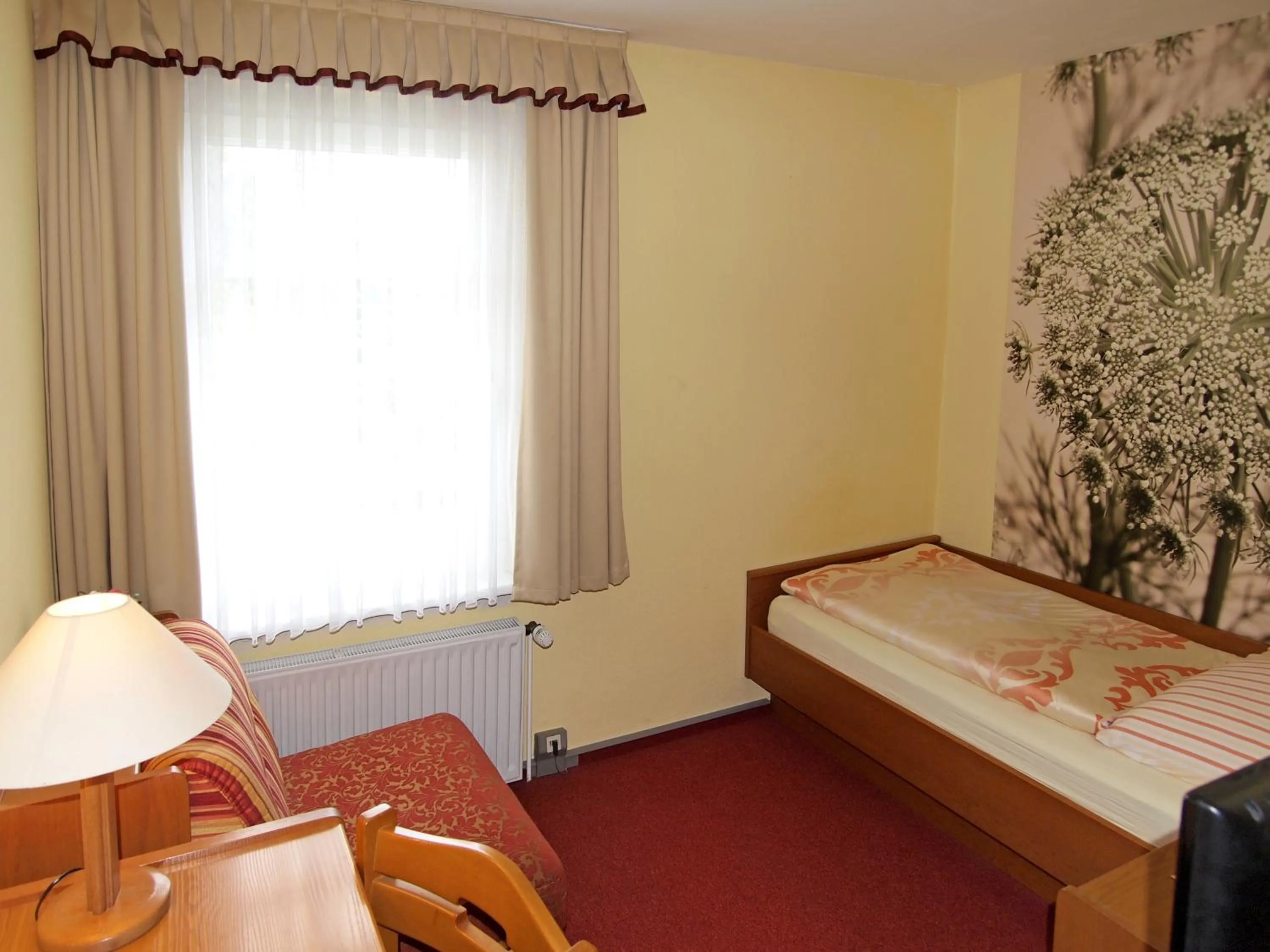 Photo of the whole room, Bed in Hotel Grüner Baum