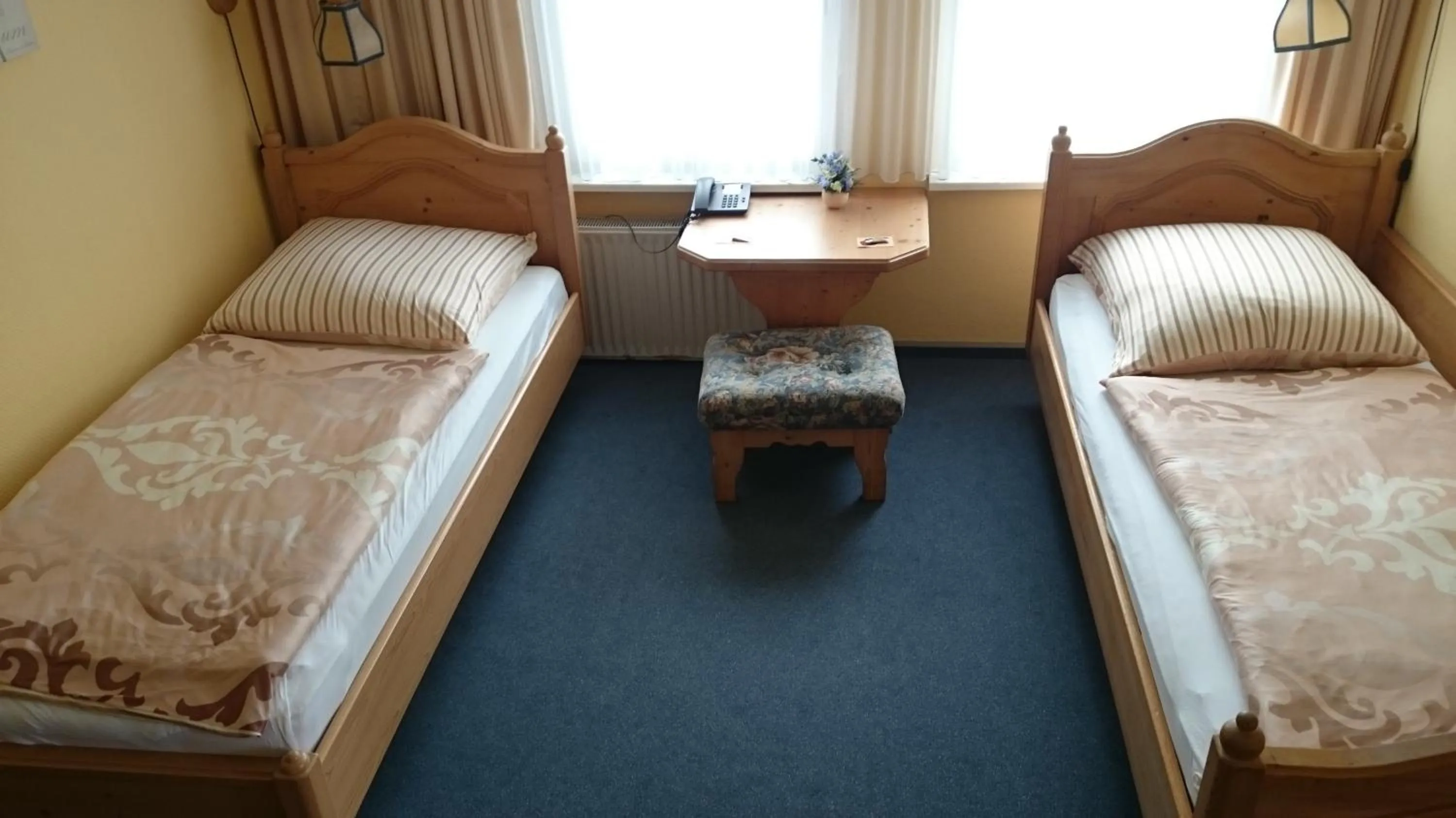 Photo of the whole room, Bed in Hotel Grüner Baum