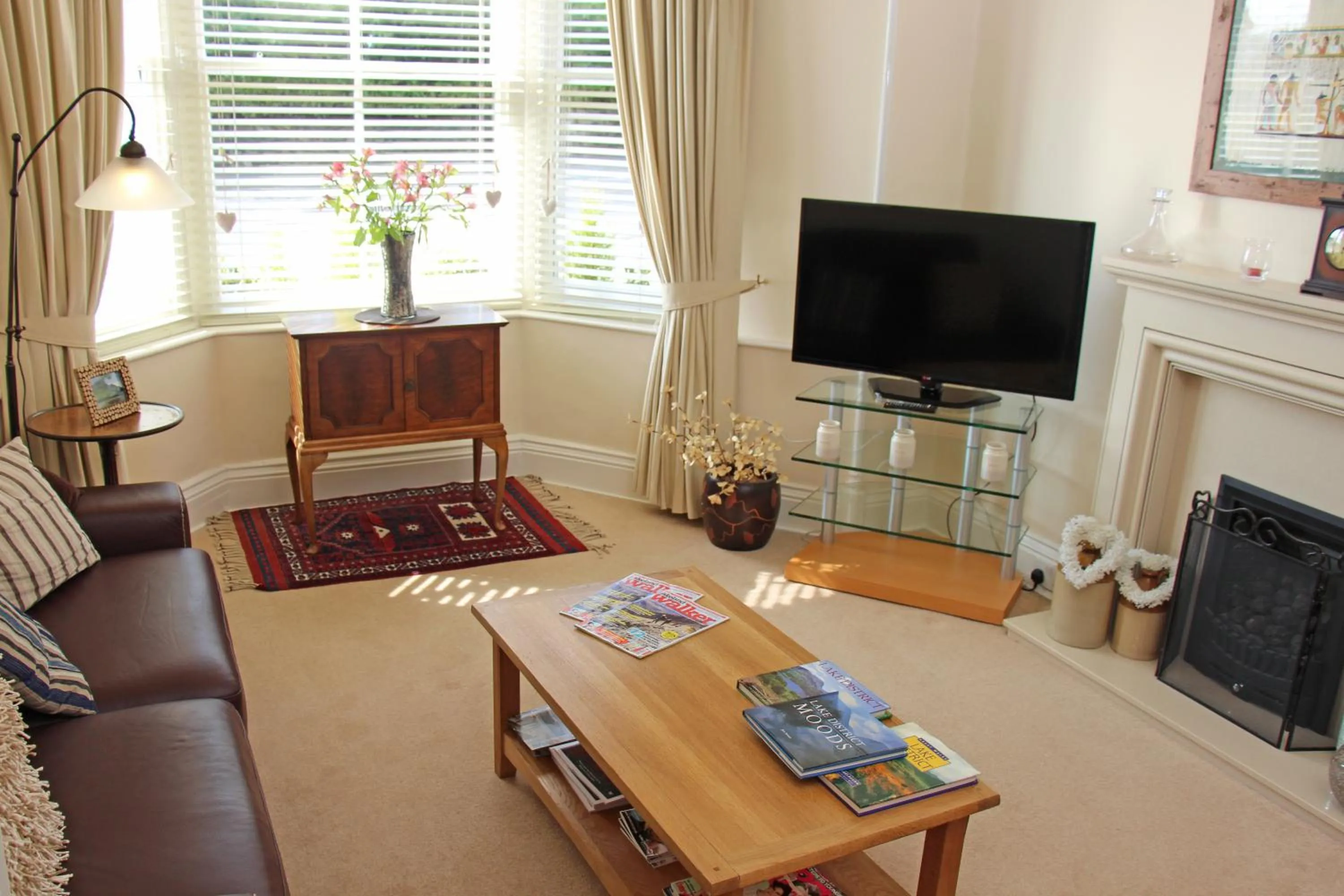 Communal lounge/ TV room in St John's Lodge Guest House incl off-site leisure club