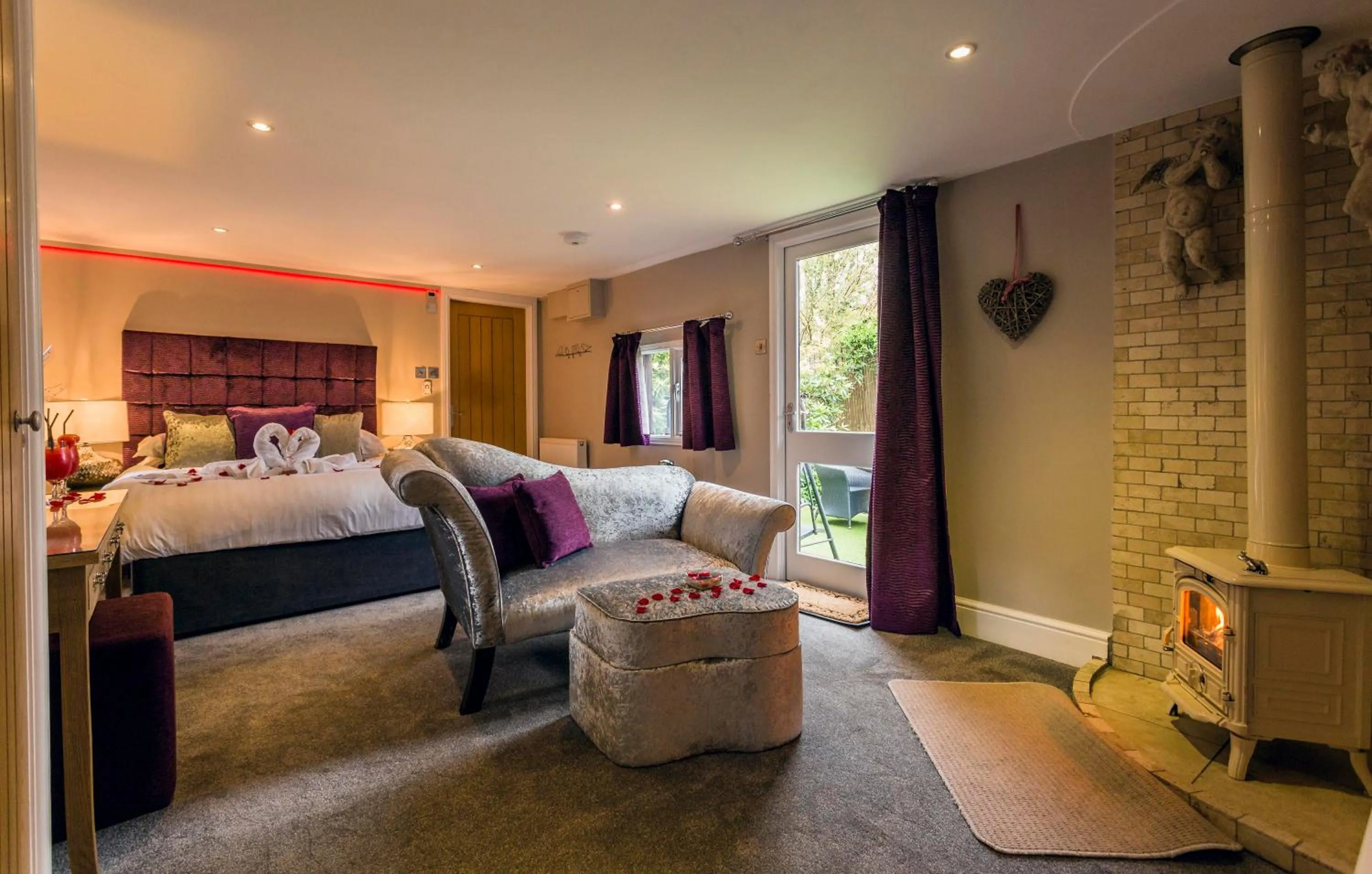 Seating area, Bed in Aphrodites Group - Luxury Hot Tub Suites in Central Lake District!