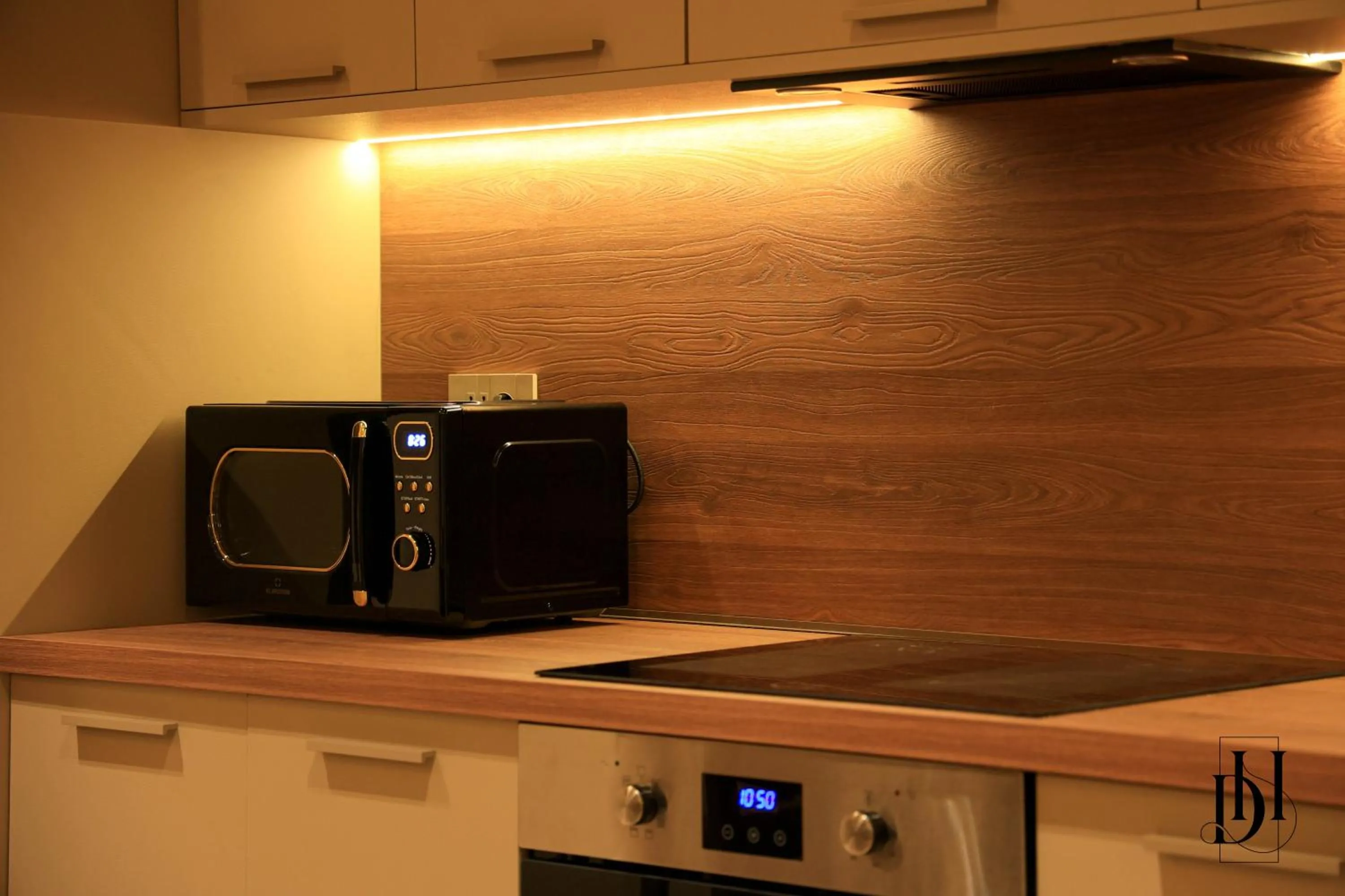 Kitchen or kitchenette in DeHa Rooms & Apartments