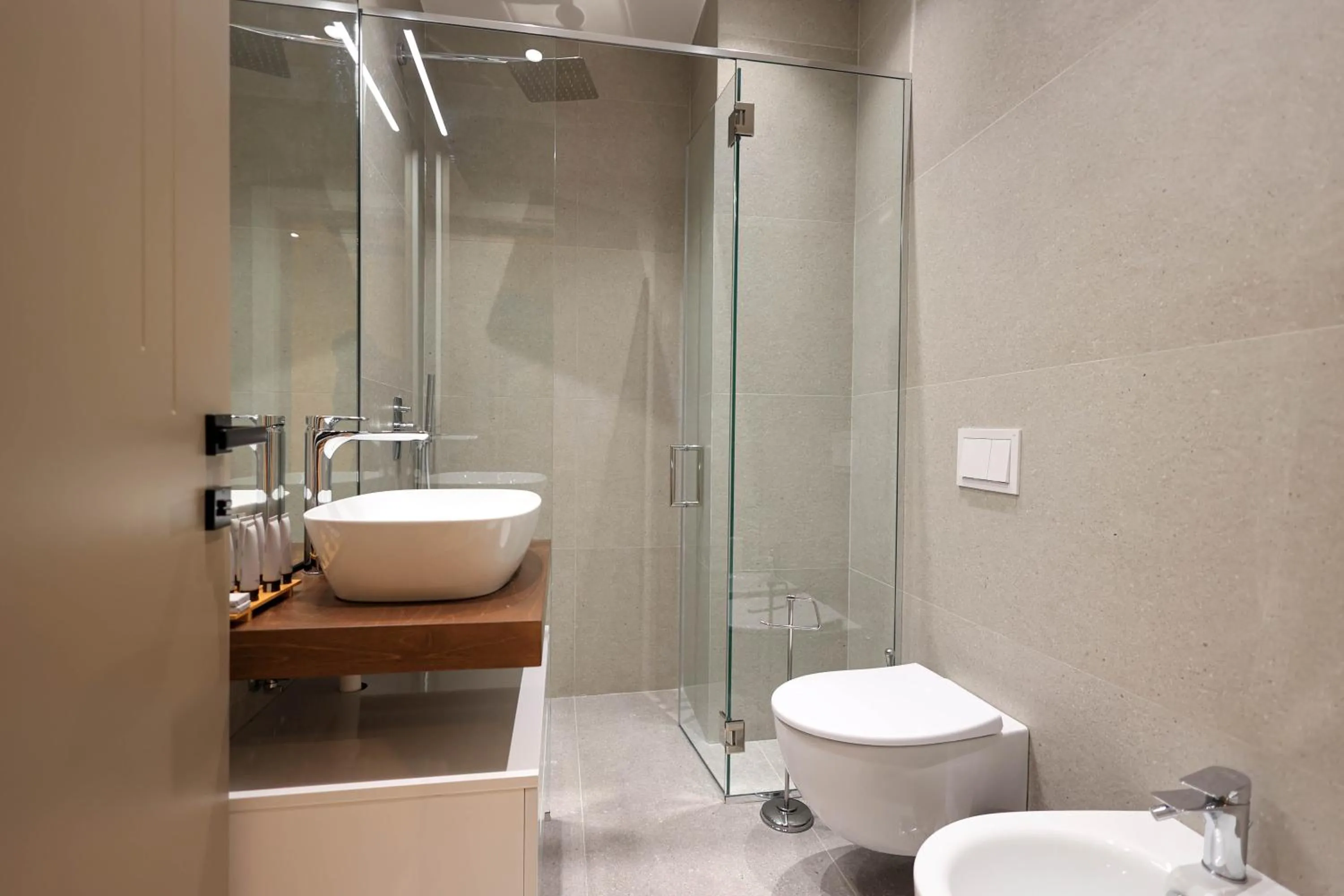 Shower in DeHa Rooms & Apartments