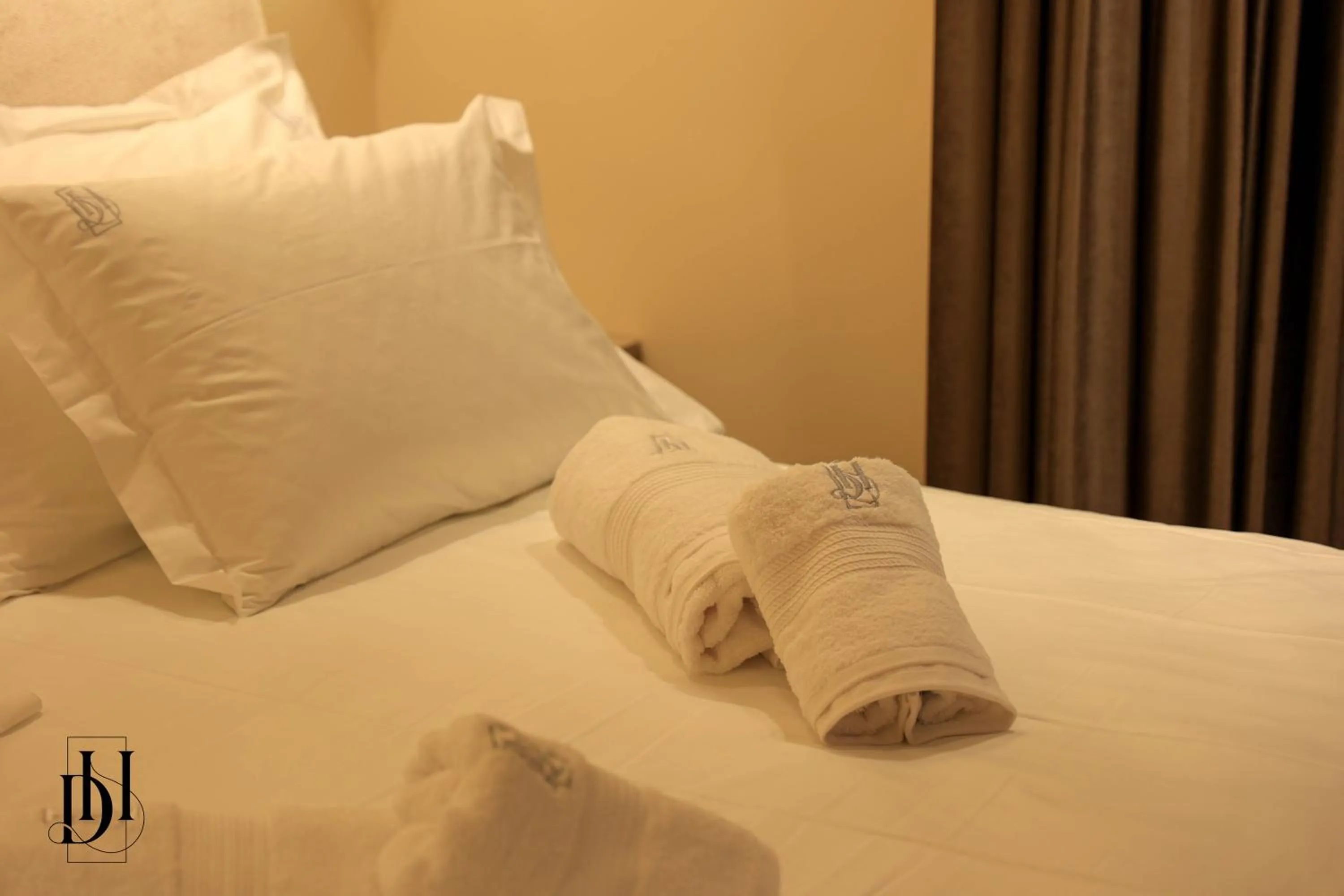 Bed in DeHa Rooms & Apartments