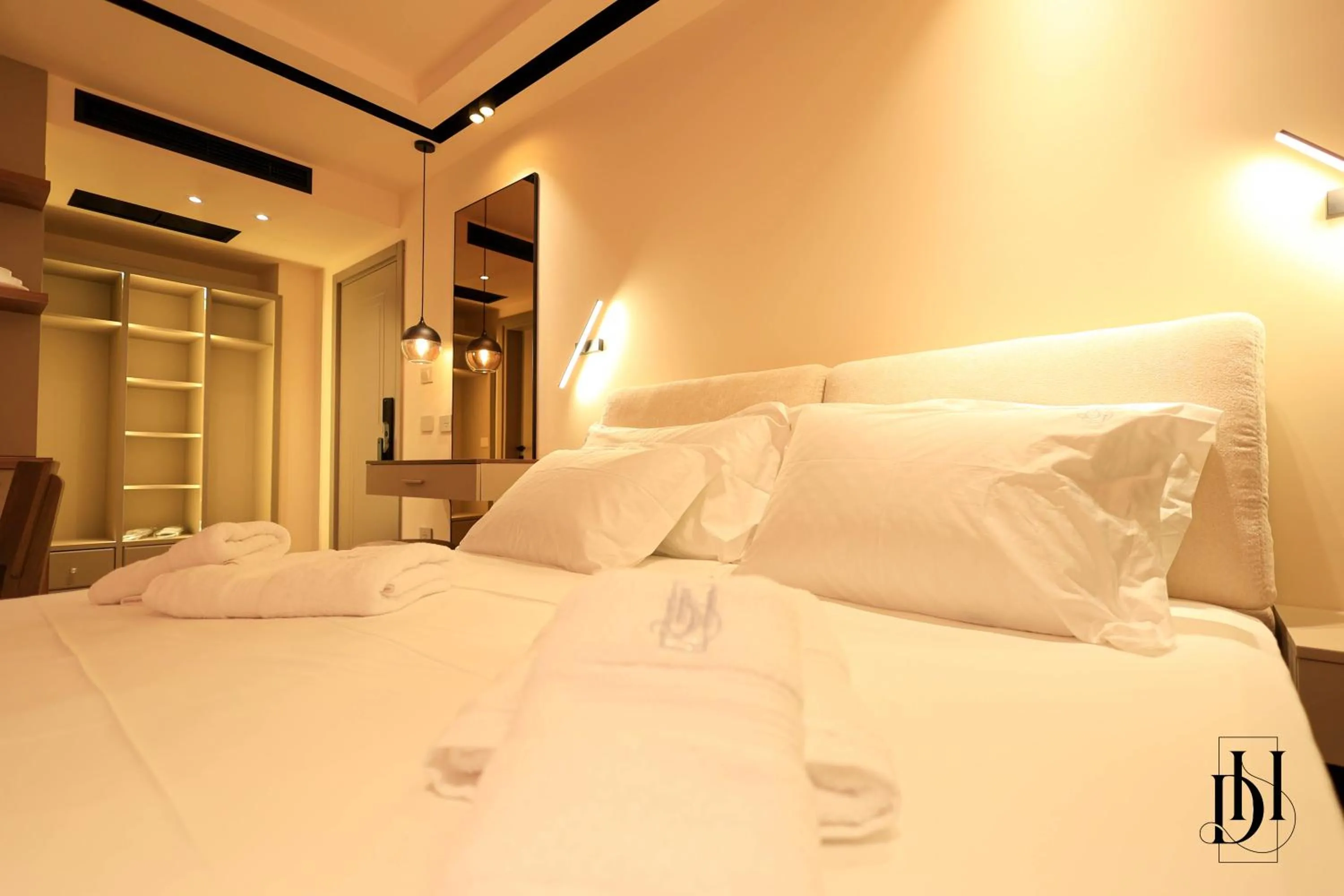 Bed in DeHa Rooms & Apartments