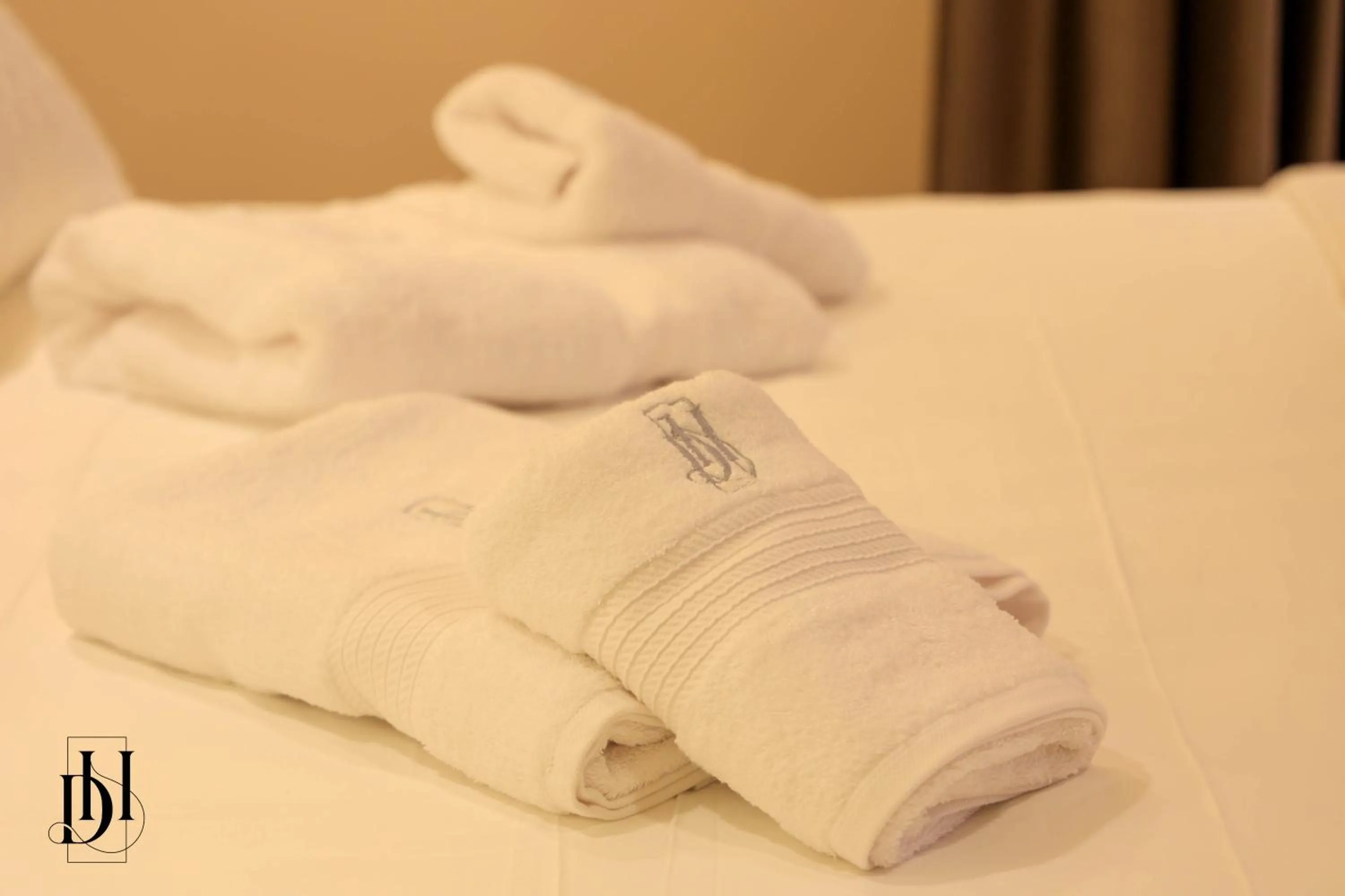 towels in DeHa Rooms & Apartments