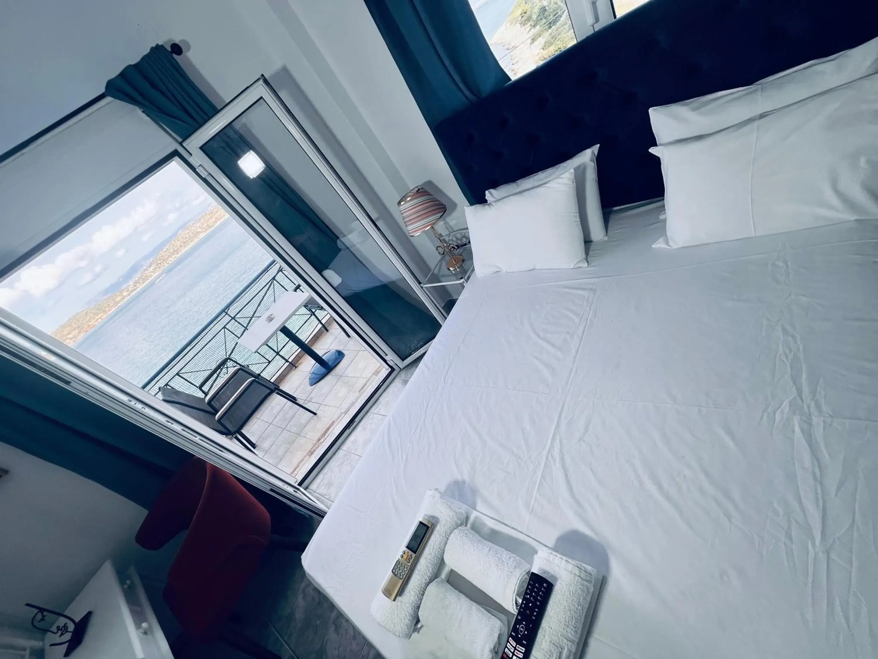 Two-Bedroom Suite with balcony and sea view in blue Hotel Two-Bedroom Suite with balcony and sea view in blue Hotel