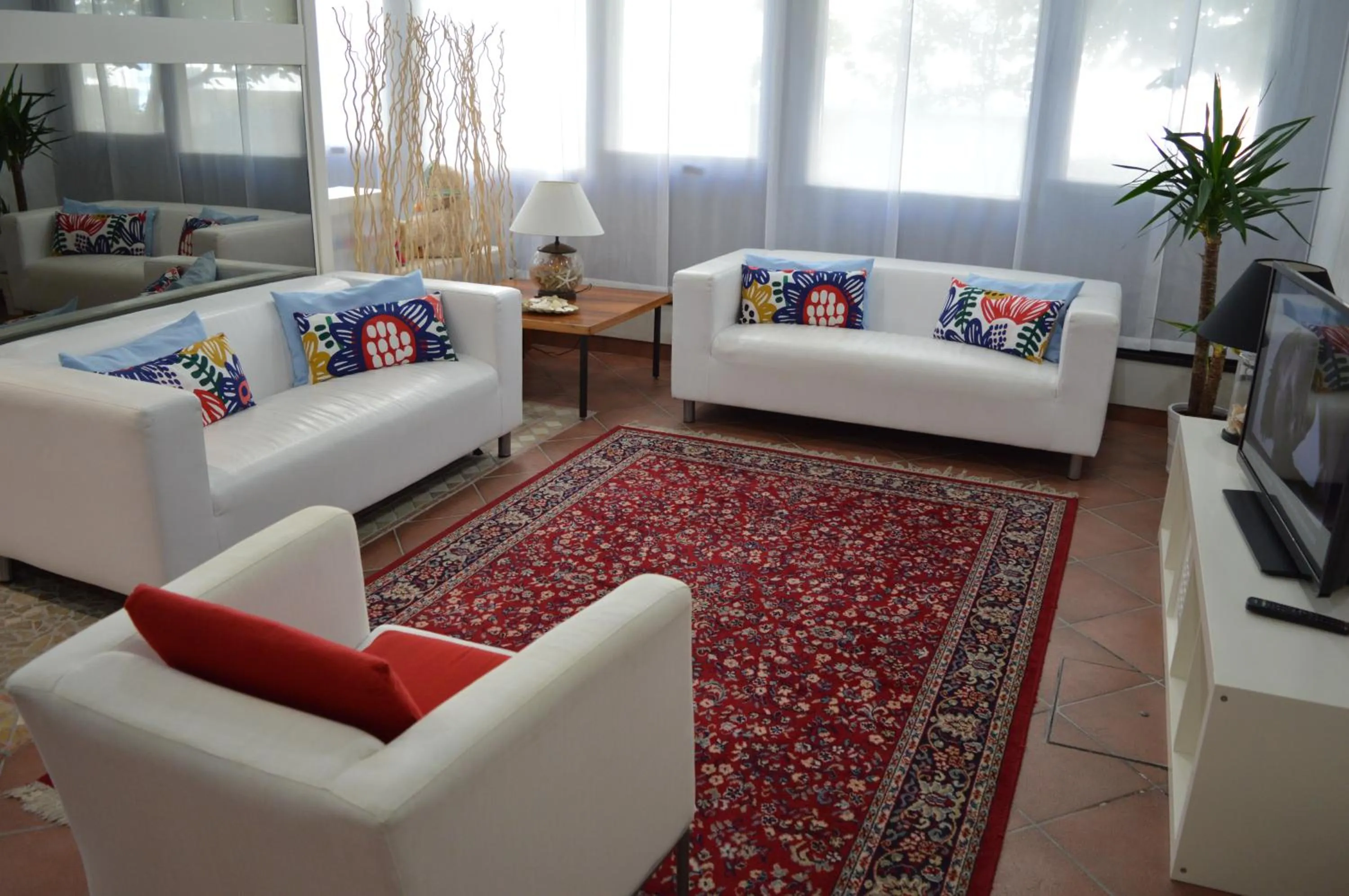 Communal lounge/ TV room in Hotel Merano