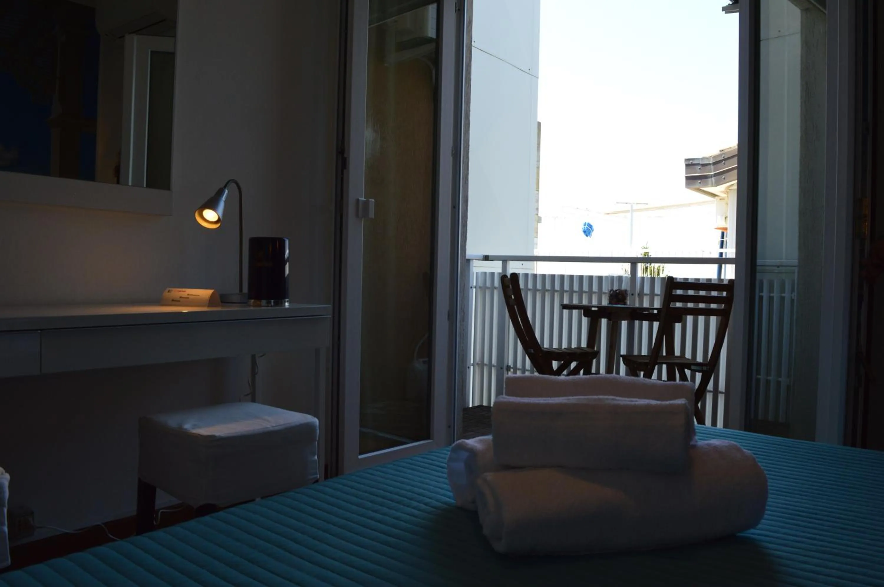 Seating area, Bed in Hotel Merano