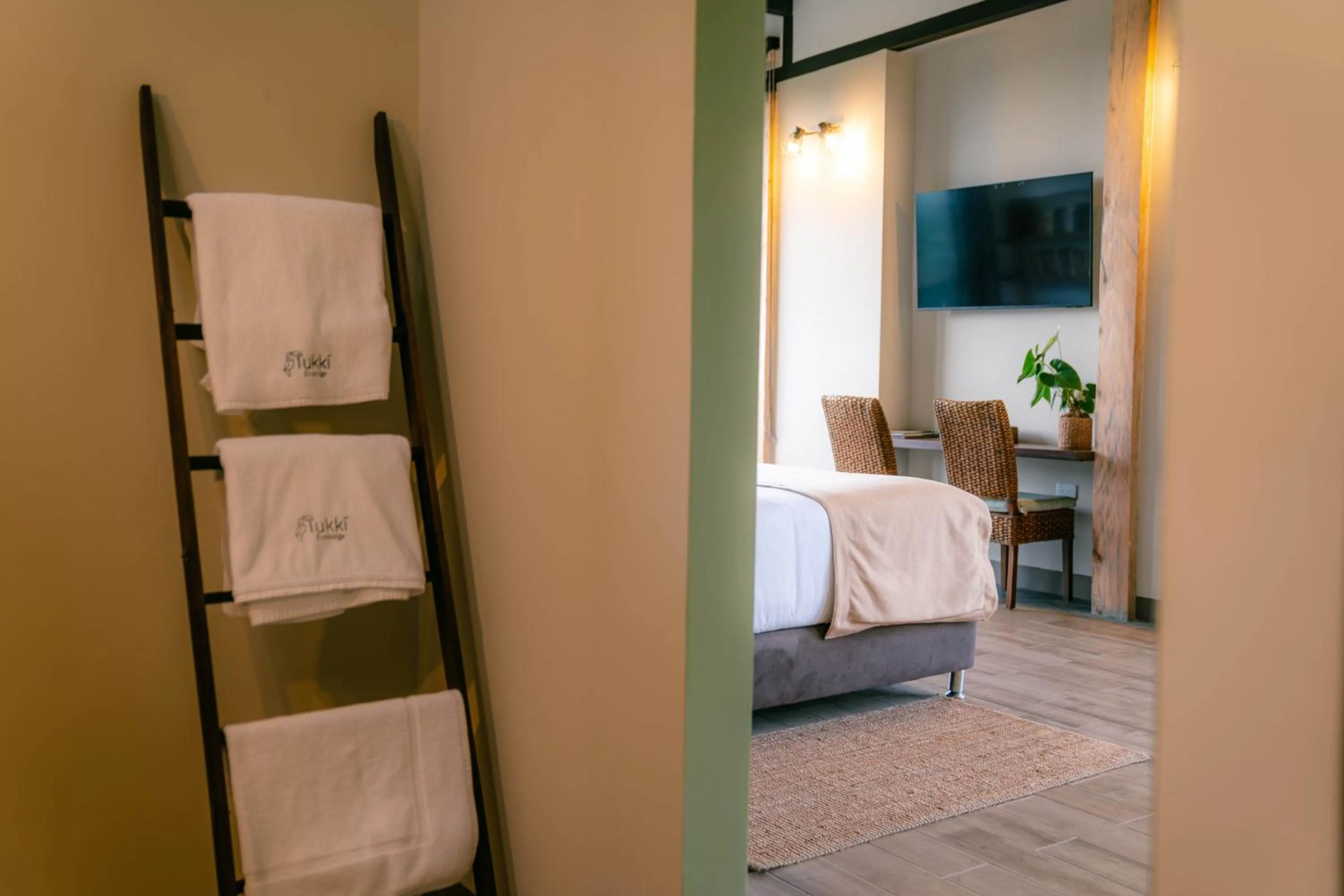 Bathroom, Bed in Tukki Ecolodge Hotel