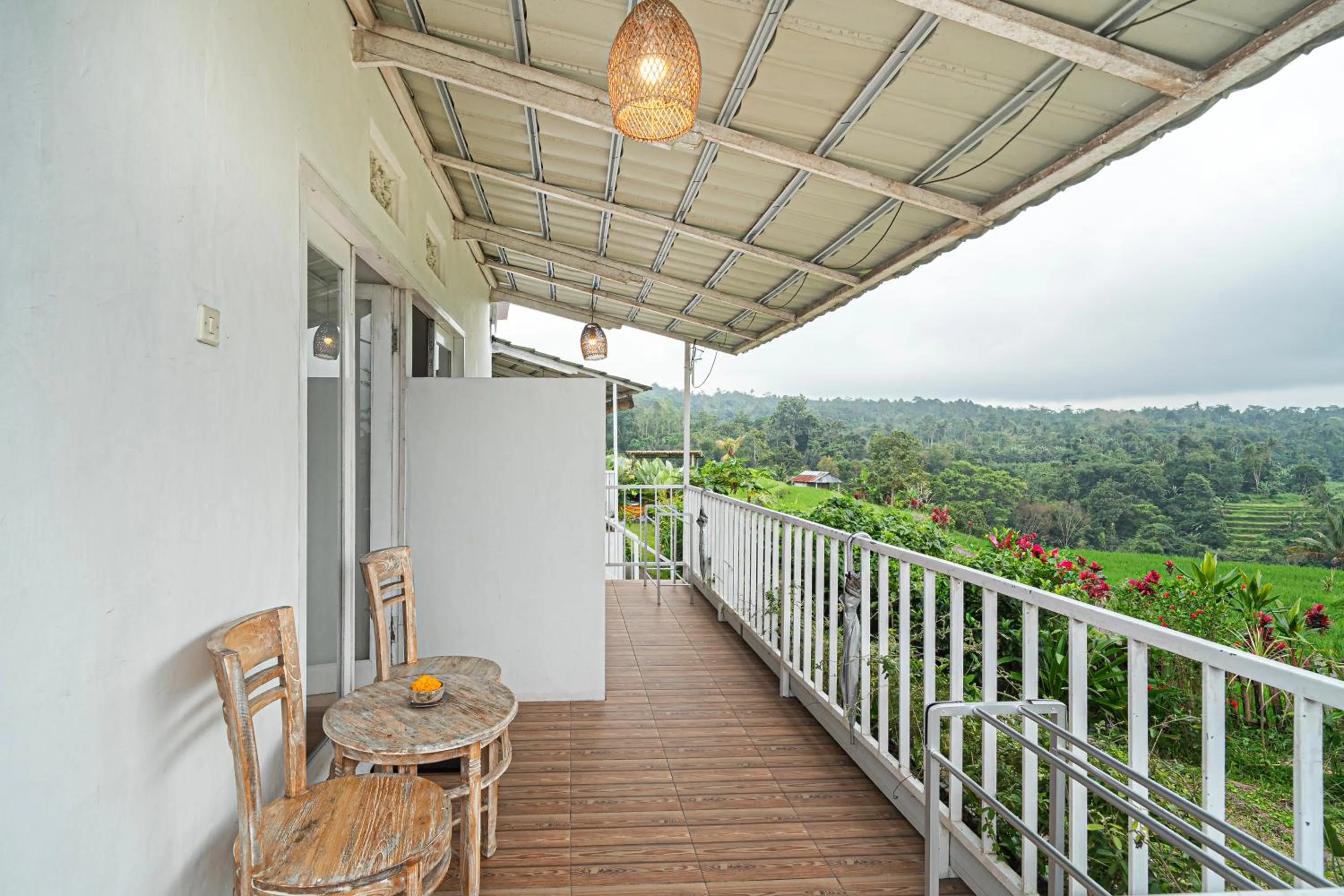 Balcony/Terrace in Jatiluwih Santya Loka Lodge & Twin Waterfall Managed by Manara
