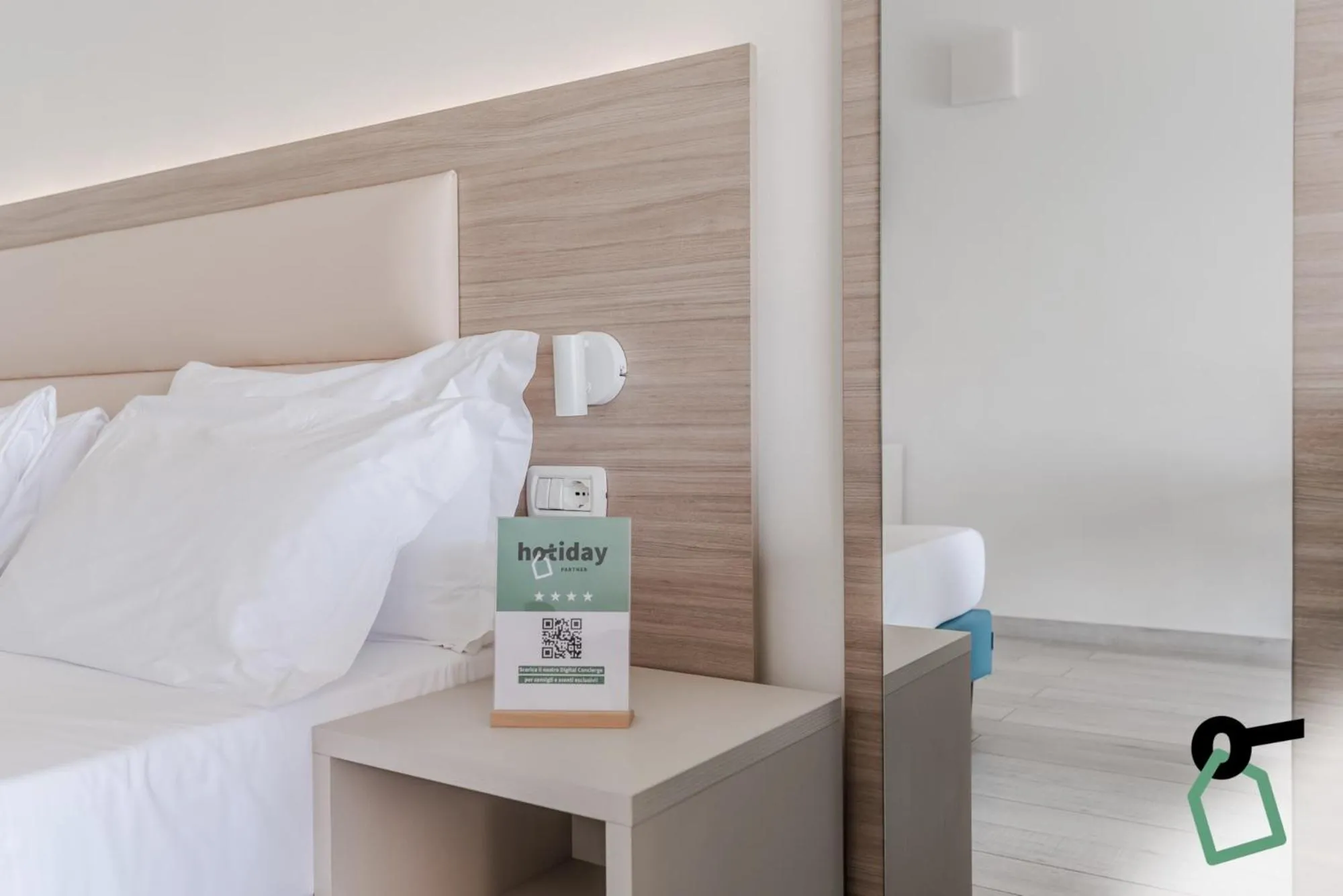 Bed in HOTIDAY Apartments Desenzano