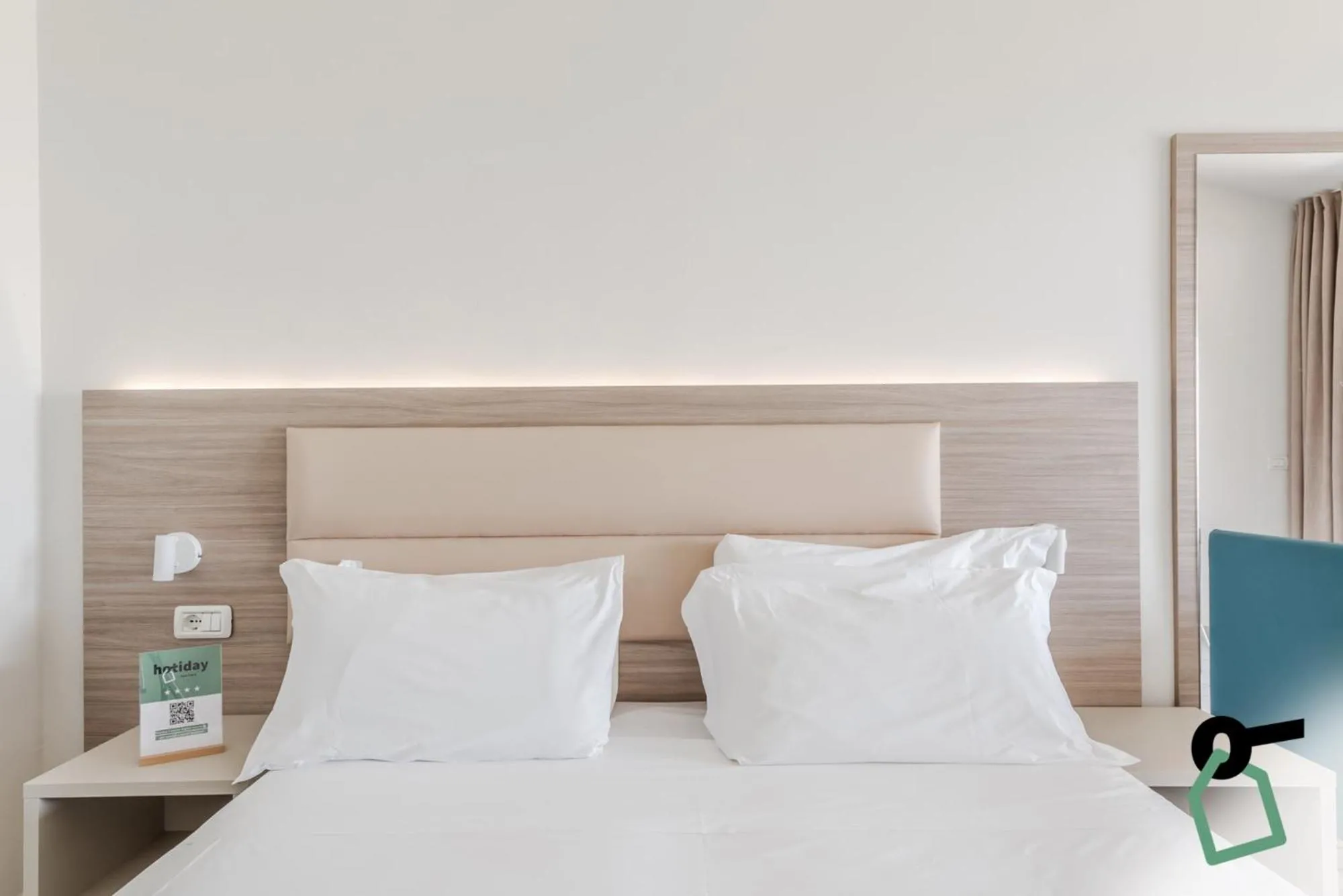 Bed in HOTIDAY Apartments Desenzano