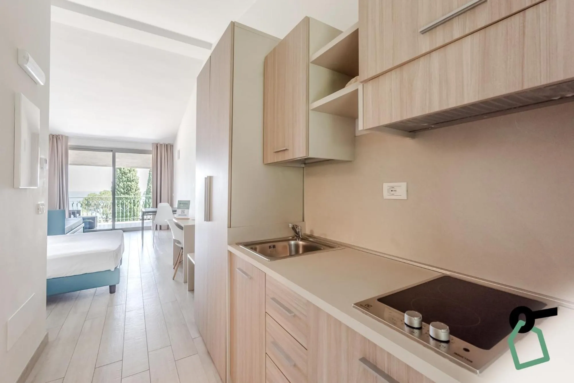 Kitchen or kitchenette in HOTIDAY Apartments Desenzano
